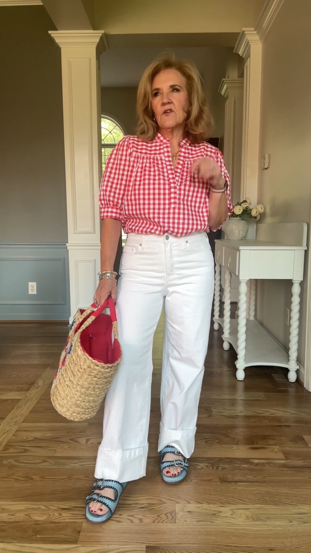 I’m going to be sharing some new pieces from Belk. That’s a southern department store that has an excellent online presence. These are from their store brand crown and Ivy. I’ve been really impressed with the quality and the price point.
Size large in the red gingham  blouse 
Size 29 in the wide leg jeans. They are very long, so I cuffed them, but you can cut them and leave the raw edge or you can have them hemmed. 

This tote is a statement and I love it for all your summertime, beach activities, parades picnics summer totes

#LTKItBag #LTKOver40 #LTKFindsUnder100