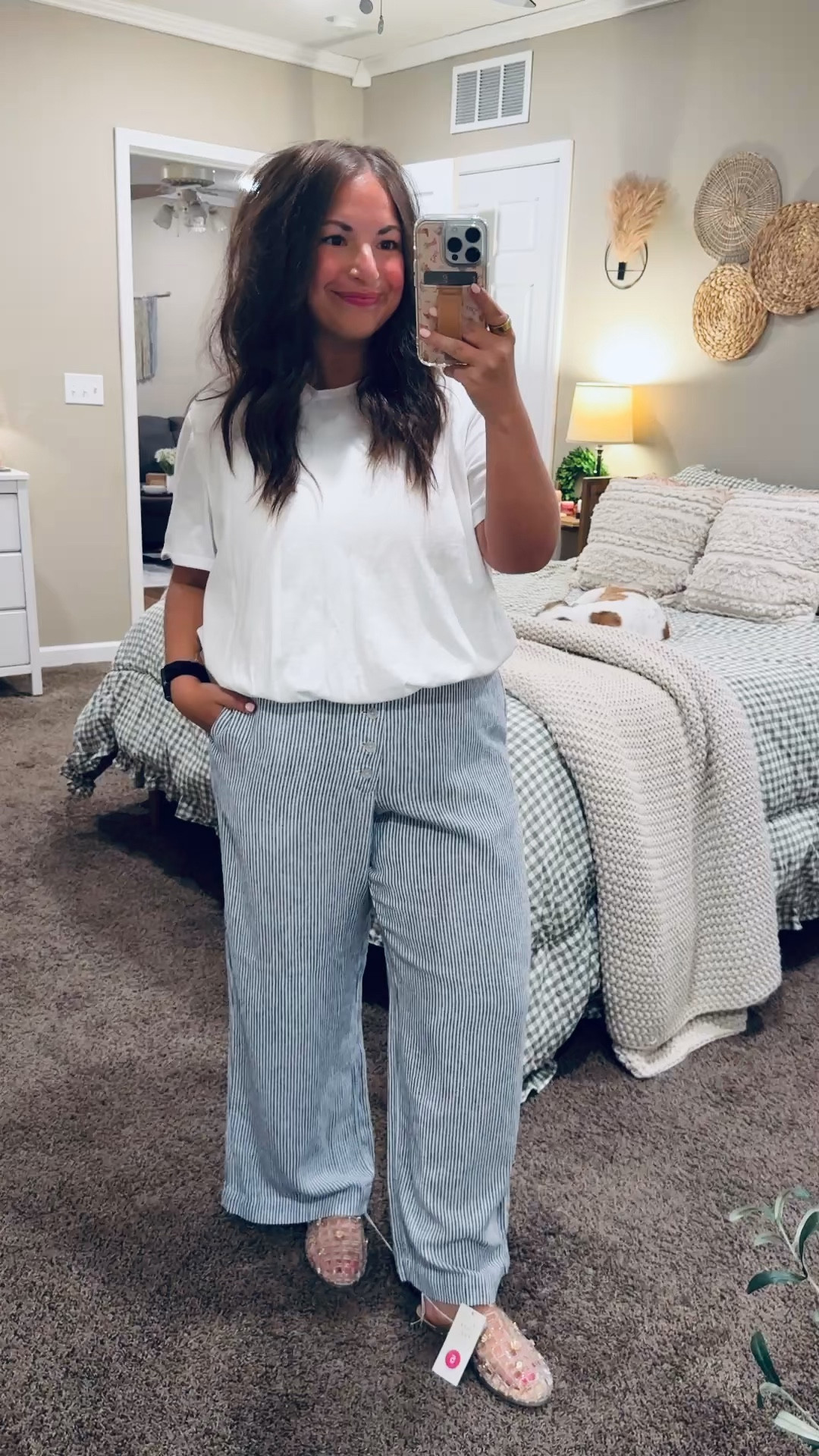Striped pants have become my favorite for spring 🌷🤍 Light, breezy, and such an easy way to add a little pattern to your everyday look. 

jelly flats: fit true to size // wearing a 5 (surprisingly comfy)
pants: fit oversized // wearing a large
bubble tee: fits true to size // wearing a large 

 #LTKootd #LTKMidsize #LTKWorkwear