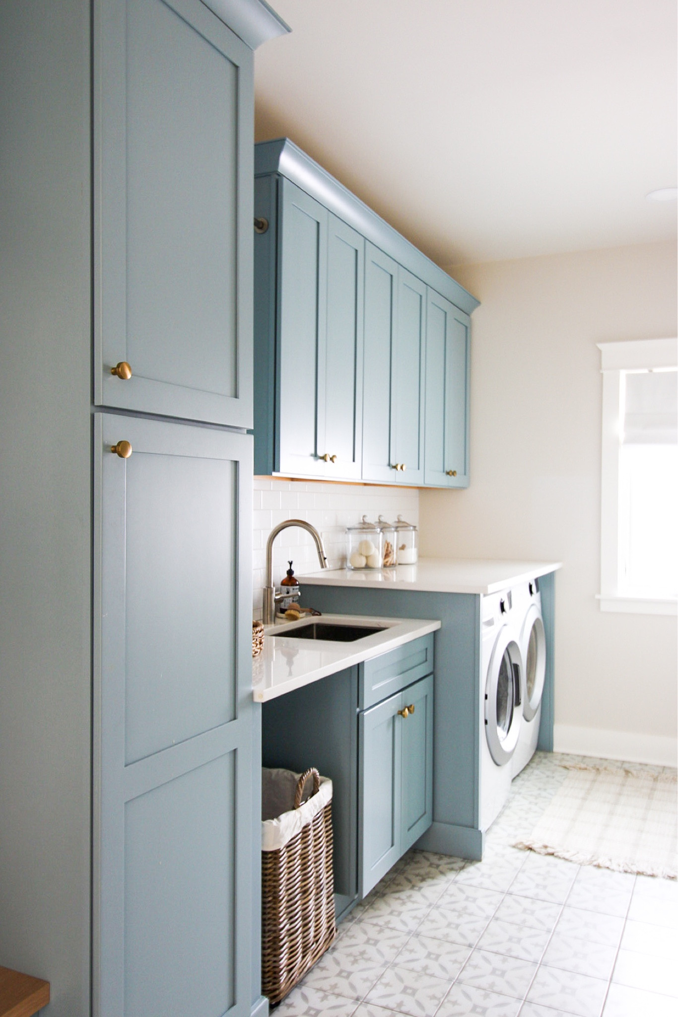 Laundry room decor, blue cabinets, mud room decor, boot bench

#LTKhome #LTKstyletip #LTKfindsunder50
