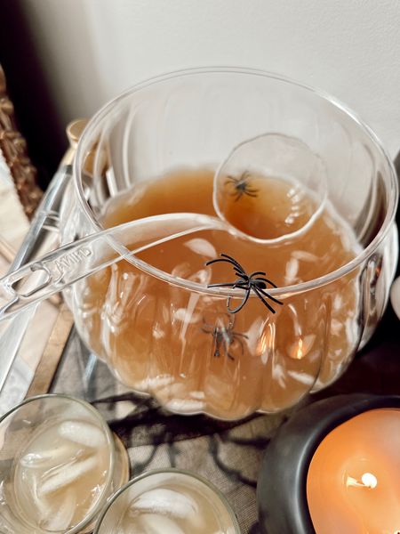 Witching brew recipe: 
- Apple Cider 
- Ice 
- Your favorite champagne 
- Add spiders for a festive drink! 

Halloween. Seasonal. Drink recipe. 

#LTKSeasonal #LTKfindsunder50 #LTKHalloween