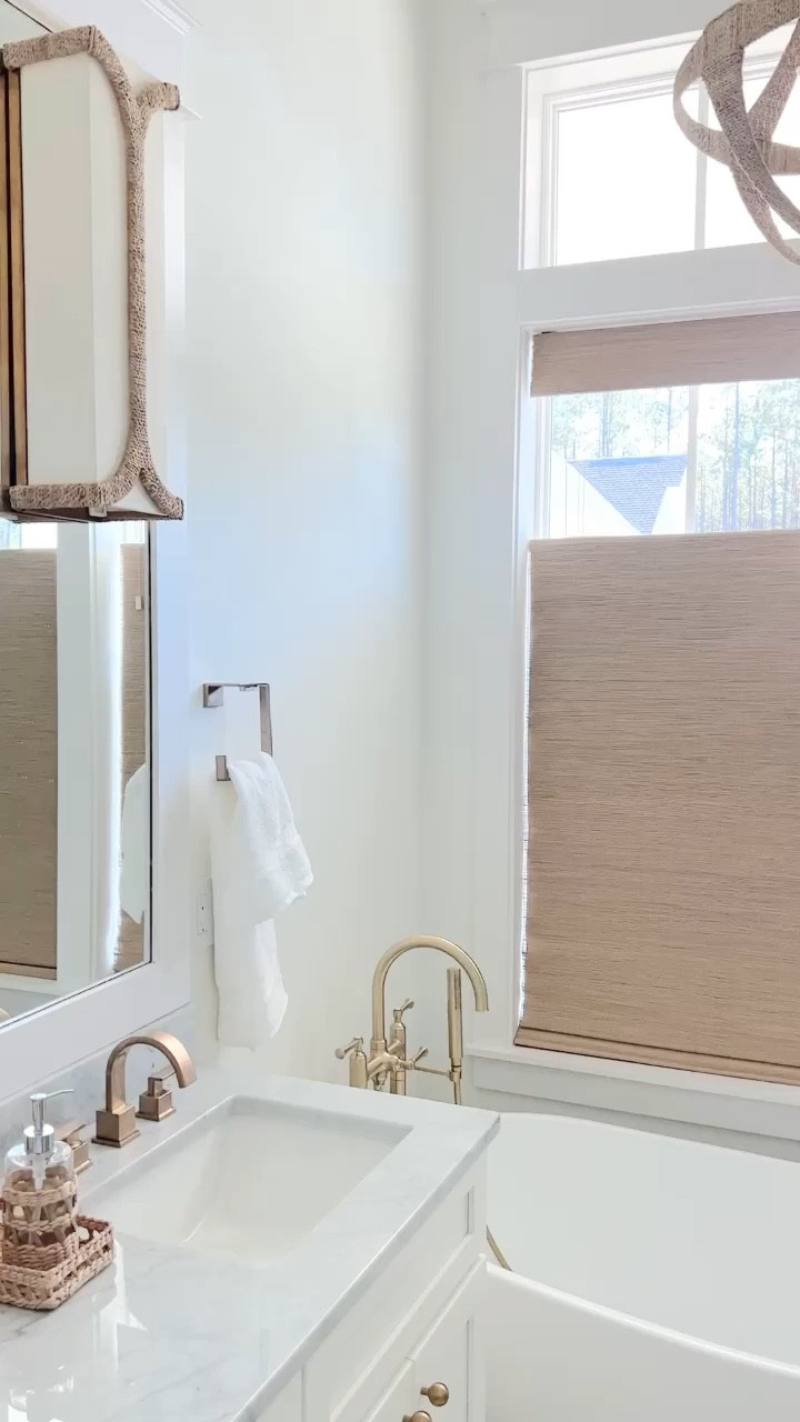 I splurged on the lighting in my bathroom and saved on lighting in all the other bathrooms of the house 🤑. These are the top down version of the “capri ivory” shades I always use. 

#LTKHome #LTKStyleTip #LTKVideo