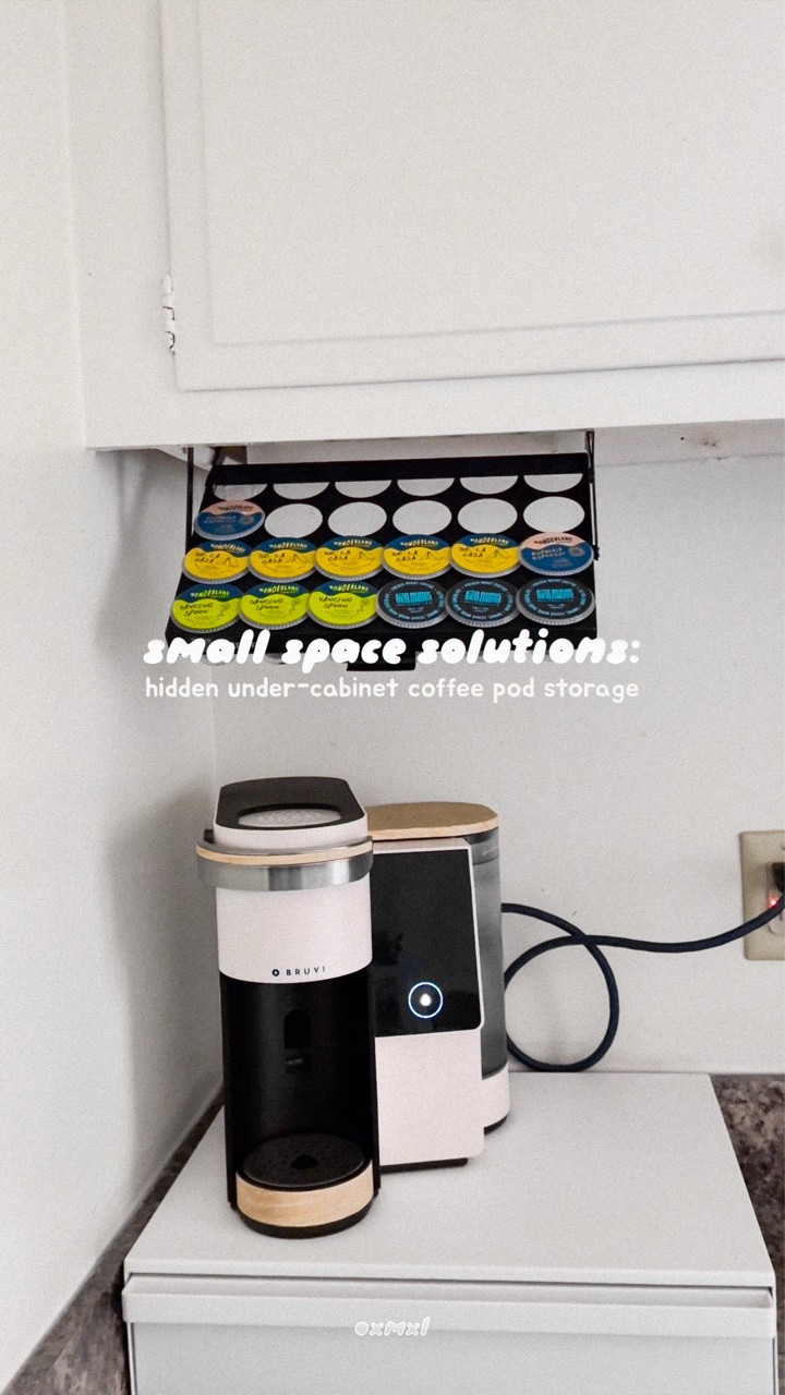 bestie you have hidden storage you’re not using! comment PODS for the link 🔗☕️ 

im actually obsessed with this under-cabinet coffee pod holder—it literally uses the dead space under your cabinets so your counter can finally breathe. holds 24 pods, swings down for easy access, and takes maybe 10 mins to install. 

small kitchen girlie APPROVED ☑️ my coffee corner went from cluttered chaos to clean + cozy, and i genuinely don’t know why i didn’t do this sooner 😭

#amazonhomefinds #homeorganization #smallspacesolutions #coffeecorner #kitchenorganizationideas

#LTKHome #LTKfoodie #LTKmorningroutine