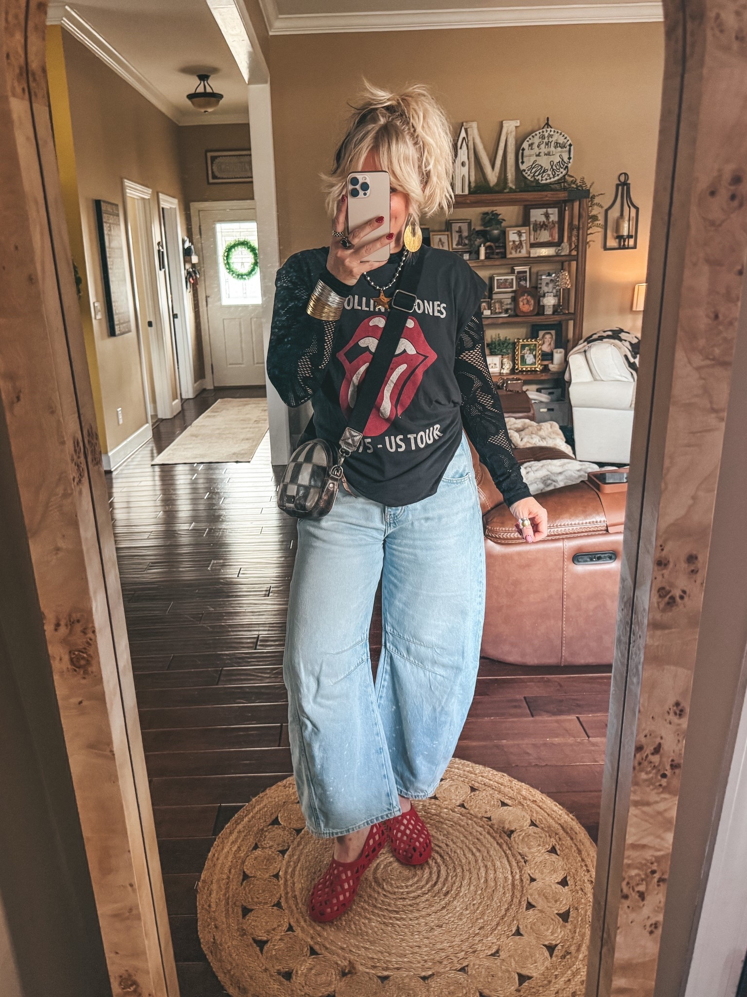 Love doing this to my tees! Makes them fit so much better and also tuck better. Perfect for the gym too. 

T-shirt 
Mesh top linked similar (mine is sold out)
Jeans sized down 
Jelly shoes true to size 

Save on my star necklace and checkered ring with code MANDIE

#LTKOver40