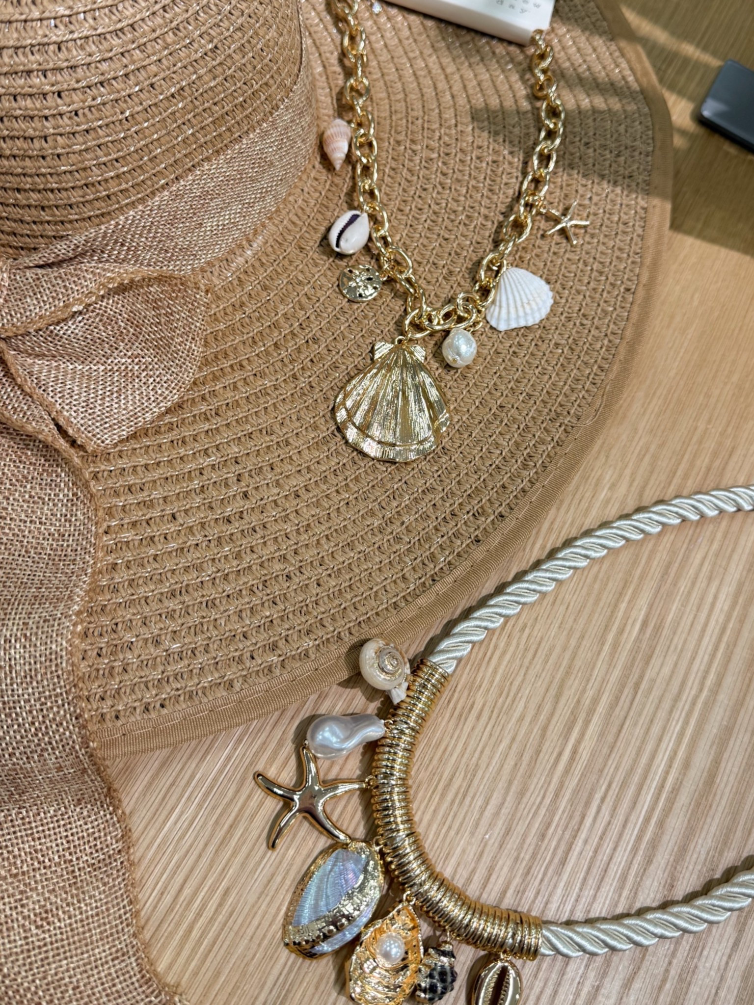 Cute charm necklaces for summer! Beaded necklaces with shells and charms are so popular right now 🤍 obsessed with these!! 

A new day, target, new arrivals, trending jewelry, fish charm, seashell, nautical, vacation looks, fashion, fancythingsblog

#LTKSeasonal #LTKootd #LTKgrwm