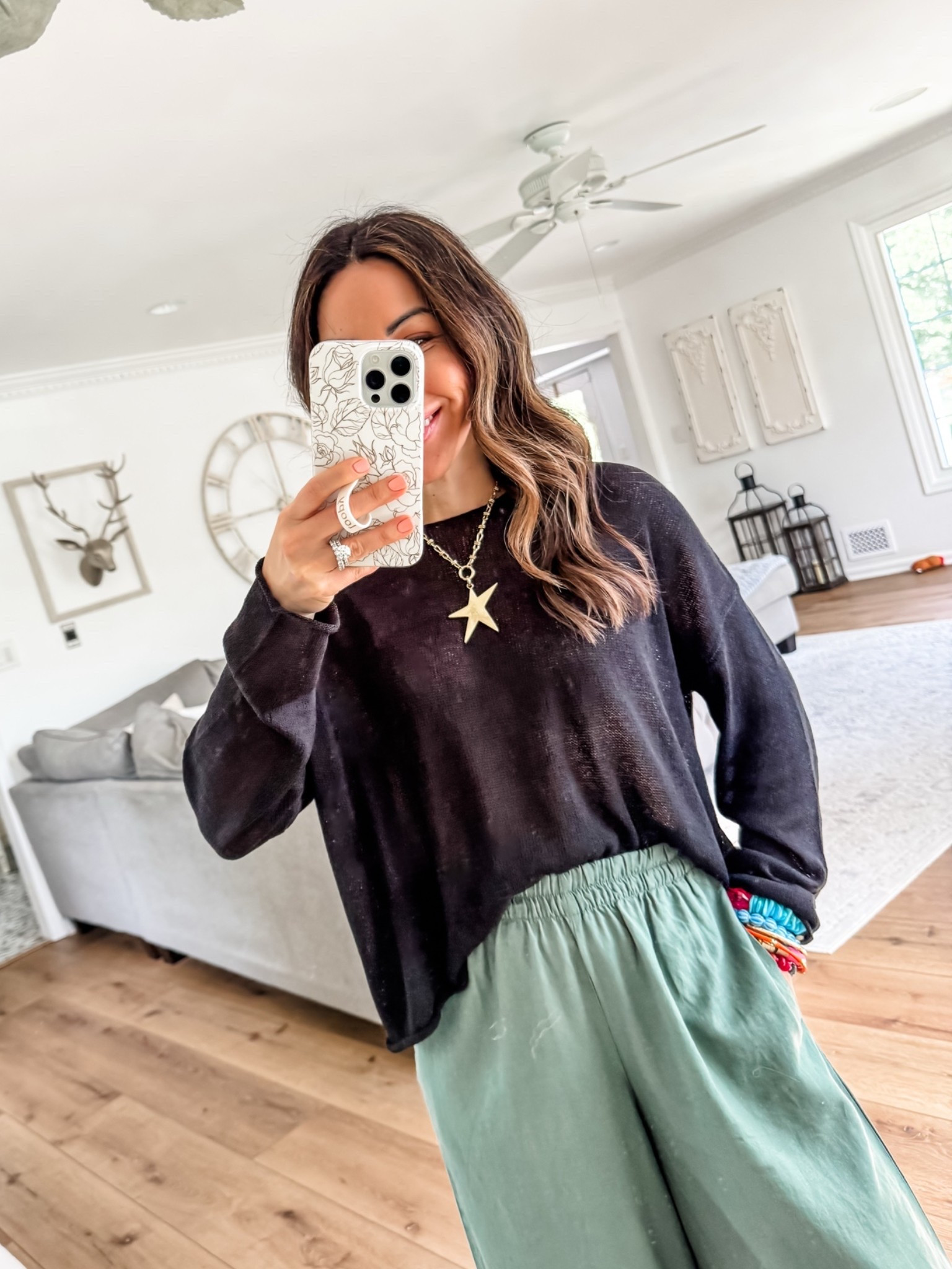 Small black sweater. Small pants.

#LTKOver40