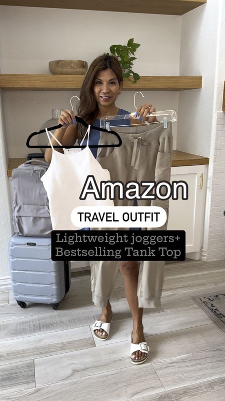Travel outfit, Airport outfit.
Cargo style lightweight joggers in small,
color is A02 Khaki. I’m 5’2”.
Ribbed tank top with built in bra in small.
Denim jacket in small. This goes in and out of stock. I also linked 2 similar jackets that I also have and love.
White sneakers fit tts and what I’m packing  to Europe for 2 weeks.
Active dress at beginning of reel is also linked, wearing XS, Slate Blue.
Personal backpack that can fit under most plane seats, fav carry-on luggage, Stanley travel mug all linked.
Amazon finds, travel outfit, travel style, airport outfit, airport style, fashion over 40, petite style, 

#LTKTravel #LTKOver40 #LTKVideo