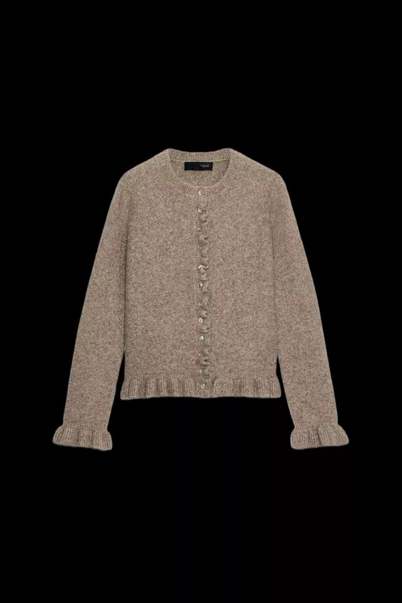 Smooth knit cardigan with round neck and long sleeves. Ruffled trim detail. Front button closure. | Zara US