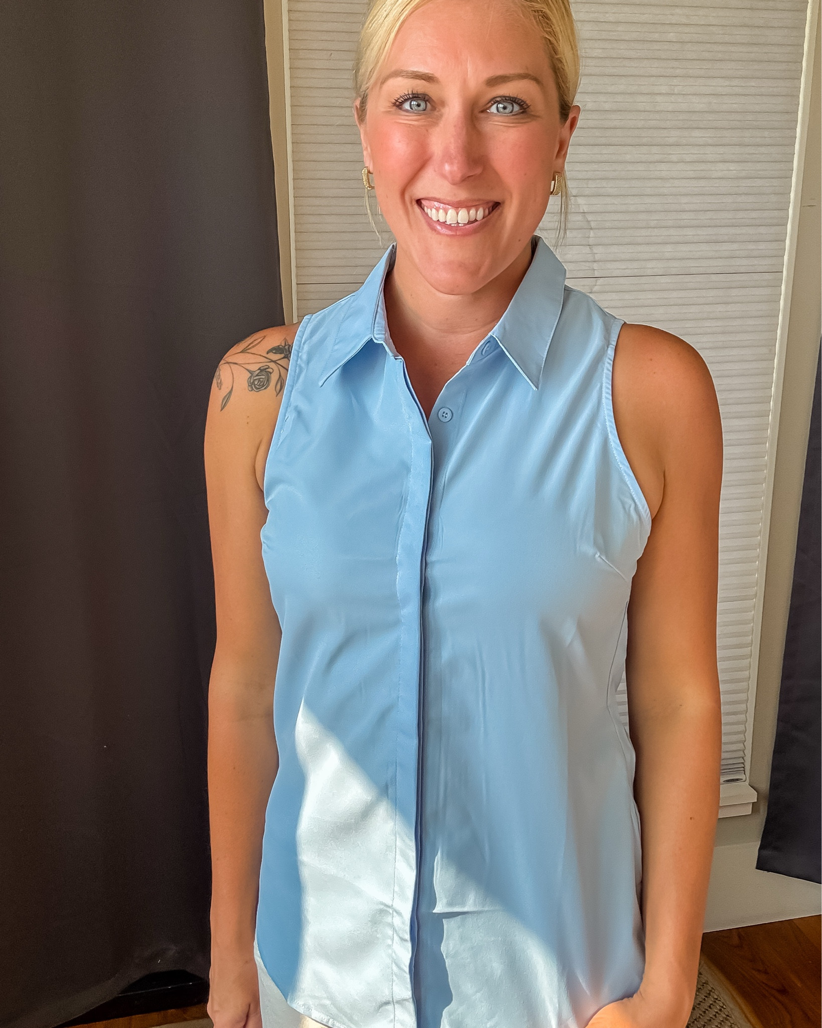 Two ways to wear it, endless summer vibes! 💙 This sleeveless button-down is lightweight, breezy, and so versatile. Wear it long and loose for a relaxed look or tie it at the waist for a casual-chic twist. 
 #SummerStaples #ButtonDownBlouse #ChicAndSimple 
