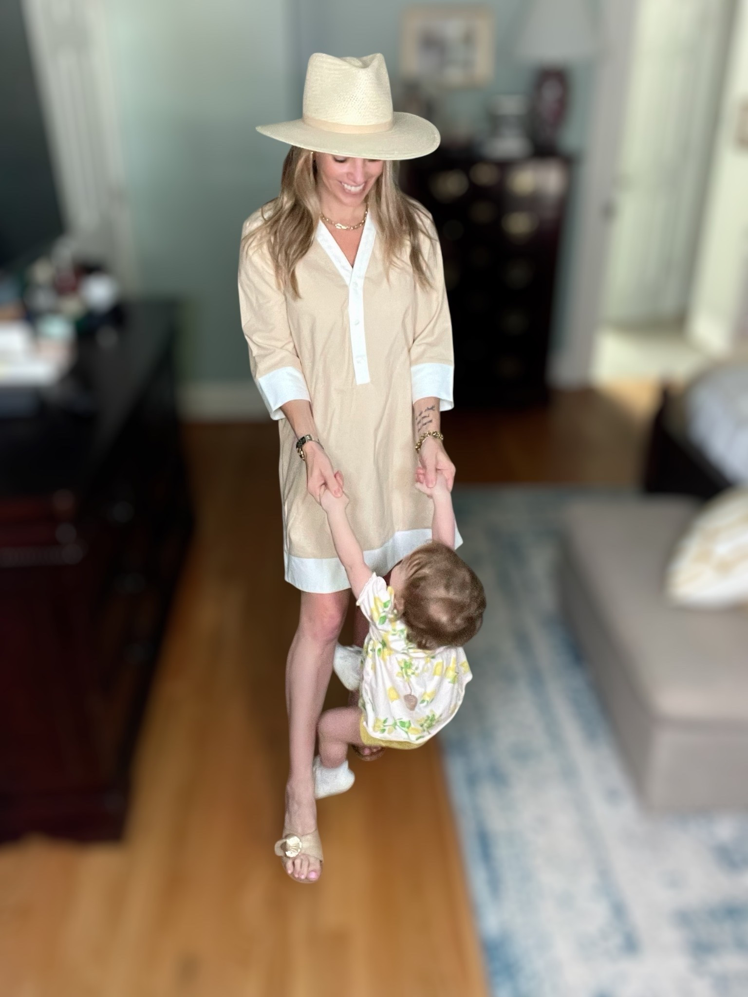 PREPPYREBEL saves on Melinda Maria ☀️ Effortless everyday style with a side of sweetness! This under-$40 Amazon shirt dress in khaki is the perfect neutral for warm-weather days. Lightweight, comfortable, and elevated with crisp white contrast trim 🤍—I love how easy it is to dress up or down. Wearing size 6–8!

👒 Topped it with my favorite Janessa Leone Sherman Hat—a luxe packable straw fedora that adds instant polish and sun protection. I kept the accessories classic with gold jewelry, bow slides 🎀, and my Heaven Mayhem Prize Earrings in Cream for a vintage-inspired touch ✨.

🍋 And how cute is baby girl in her lemon print romper?! Mommy-and-me perfection!

#AmazonDress #MommyAndMeStyle #NeutralChic #JanessaLeone #SummerStyle #PreppyMomStyle #HeavenMayhem #LTKunder50 #LTKbaby #EasyChicStyle 🍋👒💛🍼👩‍👧🎀


#LTKFindsUnder50 #LTKBaby #LTKFindsUnder100