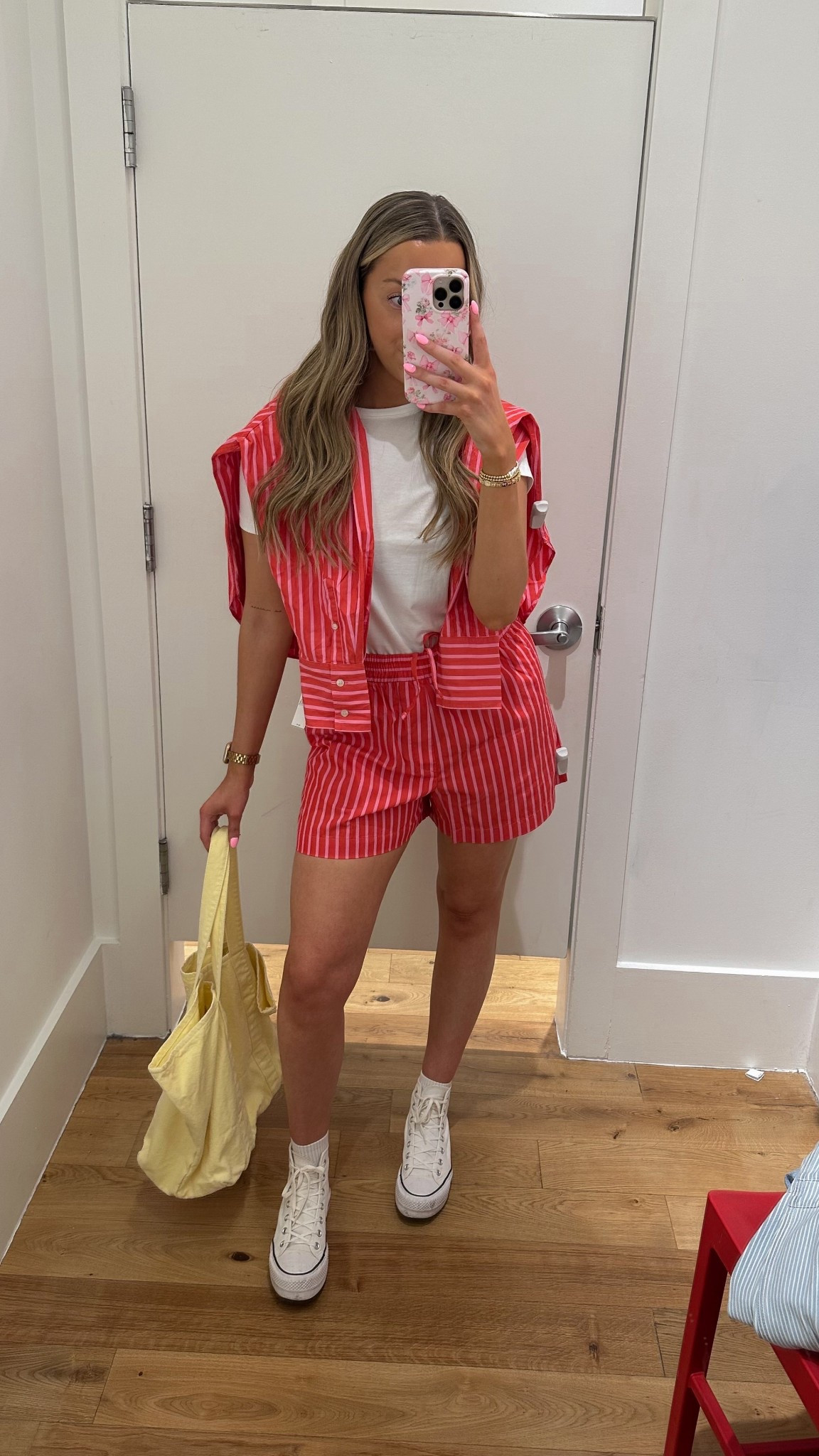 Red striped top size S
White tee size S
Red striped shorts size M
