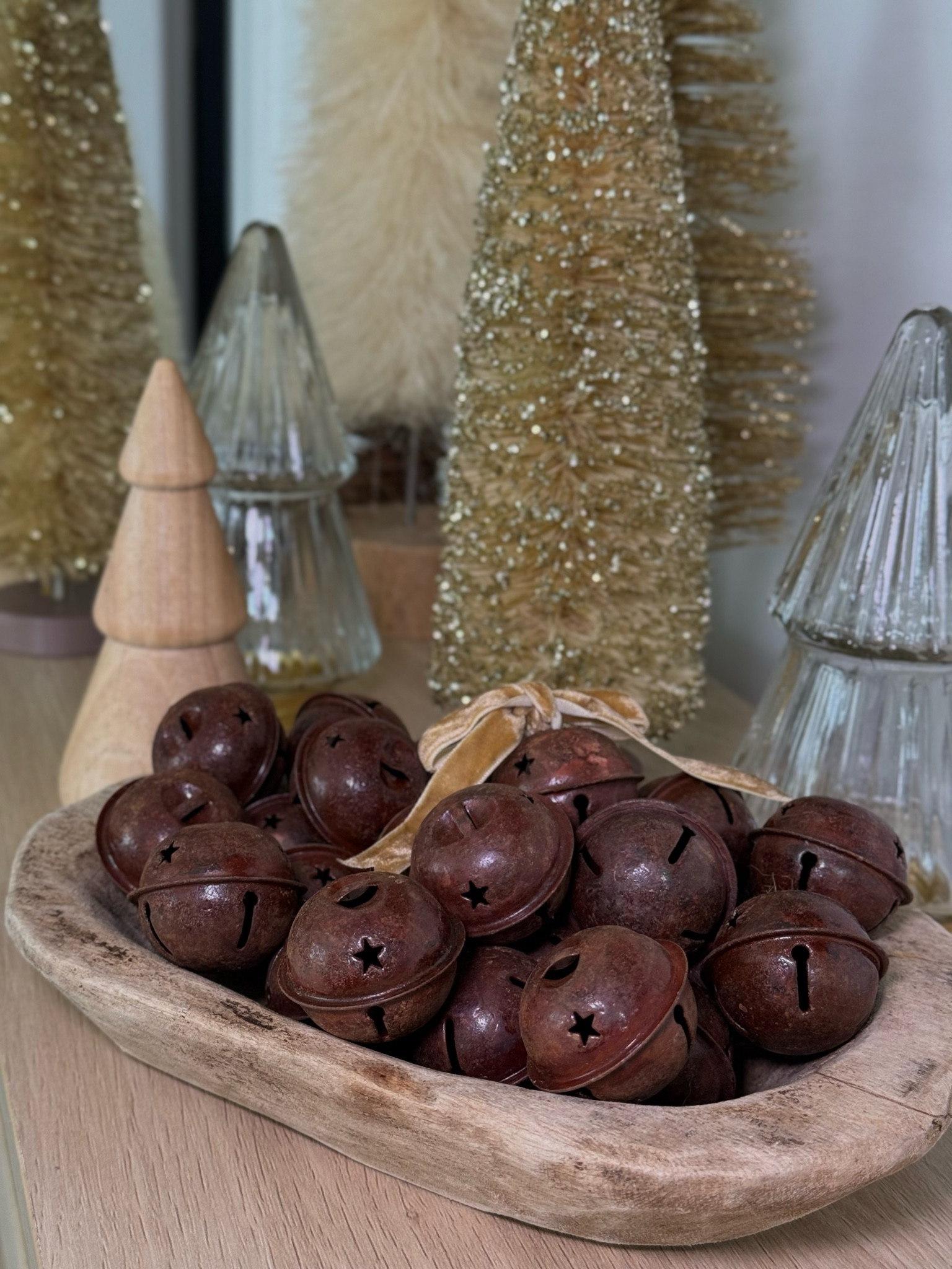These rustic bells are 10/10! They added the perfect cozy and timeless touch to my Christmas decor ✨ So easy too! Just toss them into a dough bowl (I reused my dough bowl from an old candle), tie a little ribbon around one or two and done! 

I made them into little ornaments last year and hung them on my tree which was also pretty! 

#Amazon #NeutralChristmasDecor

#LTKHome #LTKFindsUnder50 #LTKHoliday