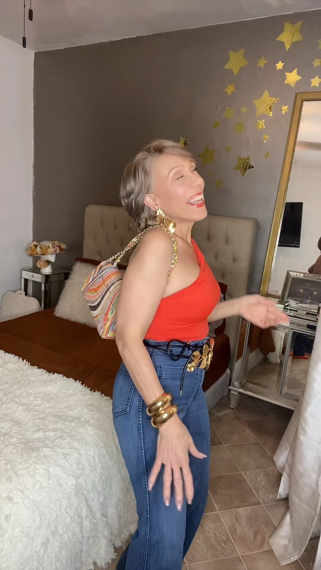 🧡 One-shoulder tops are trending! I paired this bold orange top with high-waisted H&M jeans and a floral belt for an easy summer outfit idea. #LTKfashion #H&Mstyle #SummerOutfits #OneShoulderTop #OOTD