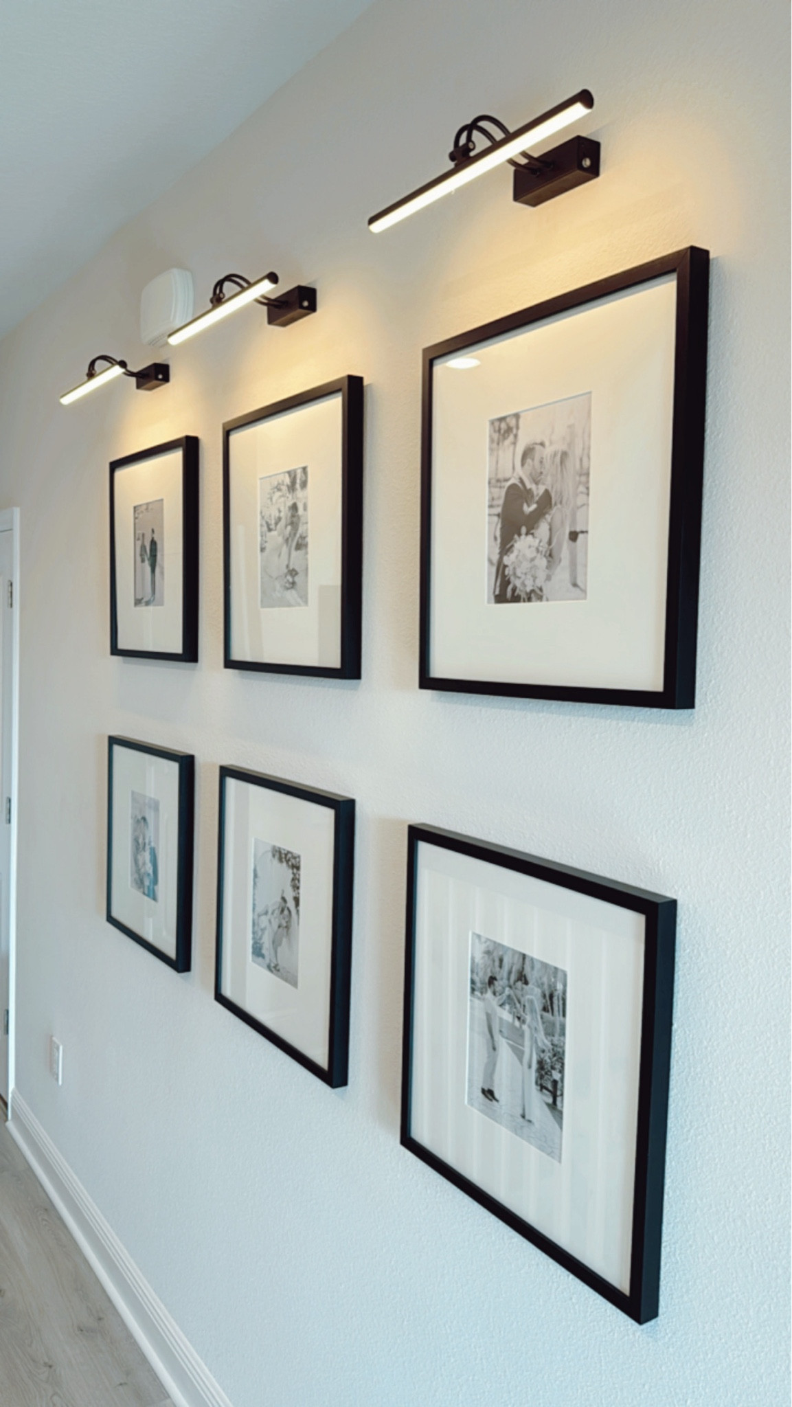 Gallery Wall inspiration 🤍✨

We used the set (of 6) black wooden picture frames with white mats from Wayfair that are currently 20% OFF! We used the 16 in. battery operated sconces as lights above each set of frames. These sconces are remote control with dimmer, size,  and timer options. 

Gallery Wall, Wedding Pictures, Family Portrait Wall, Accent Wall, Picture Wall, Black and White Photo Wall, Picture Frame Wall, Oversized Picture Frames, Gallery Wall Lighting, Sconces, Modern Sconces, Battery Operated Sconces, Battery Operated Wall Lights, black metal picture frame, pottery barn picture frame, Wayfair picture frame, black picture frame, modern picture frames, modern home decor, neutral home decor, family room decor, living room decor, entryway wall, entryway decor, hallway decor, home decor, modern home decor, white mat frames, wall gallery, wedding photographs display, picture display, picture wall, photo lights, photo sconces, automatic lighting, automatic sconces, hallway lighting, hallway sconces, black sconces , black picture light, black metal sconces, black wooden picture frames, black wooden frames, 25x25 picture frames

#LTKHome #LTKStyleTip #LTKSaleAlert