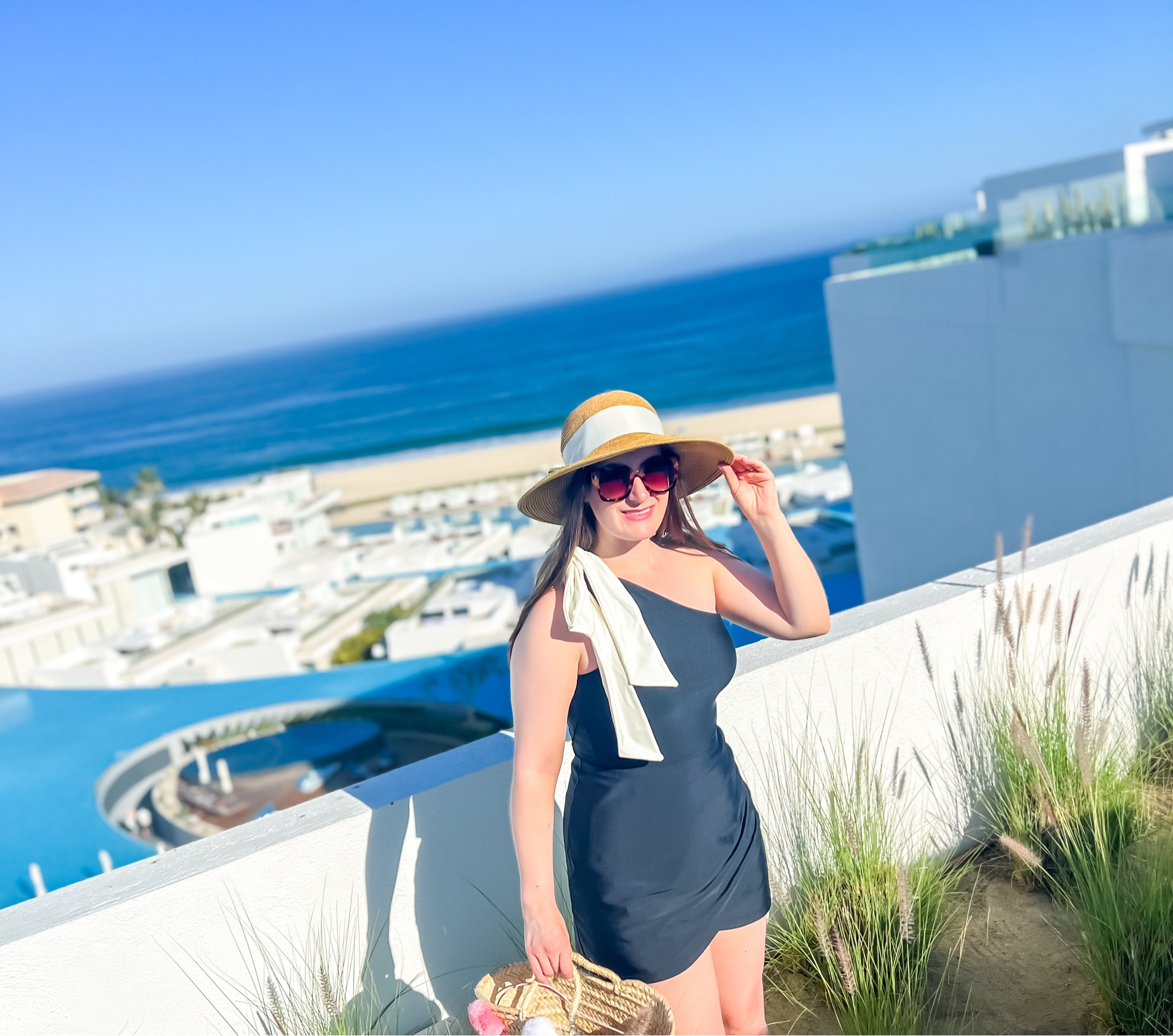 Happy Memorial Day Weekend! 🇺🇸❤️🤍💙Missing this view, but excited to head to the lake with family. 

Love my @summersalt swimsuit and swim skirt. It has full coverage in the back and is perfect for chasing little ones. 🤣

#LTKFindsUnder100 #LTKTravel #LTKSwim