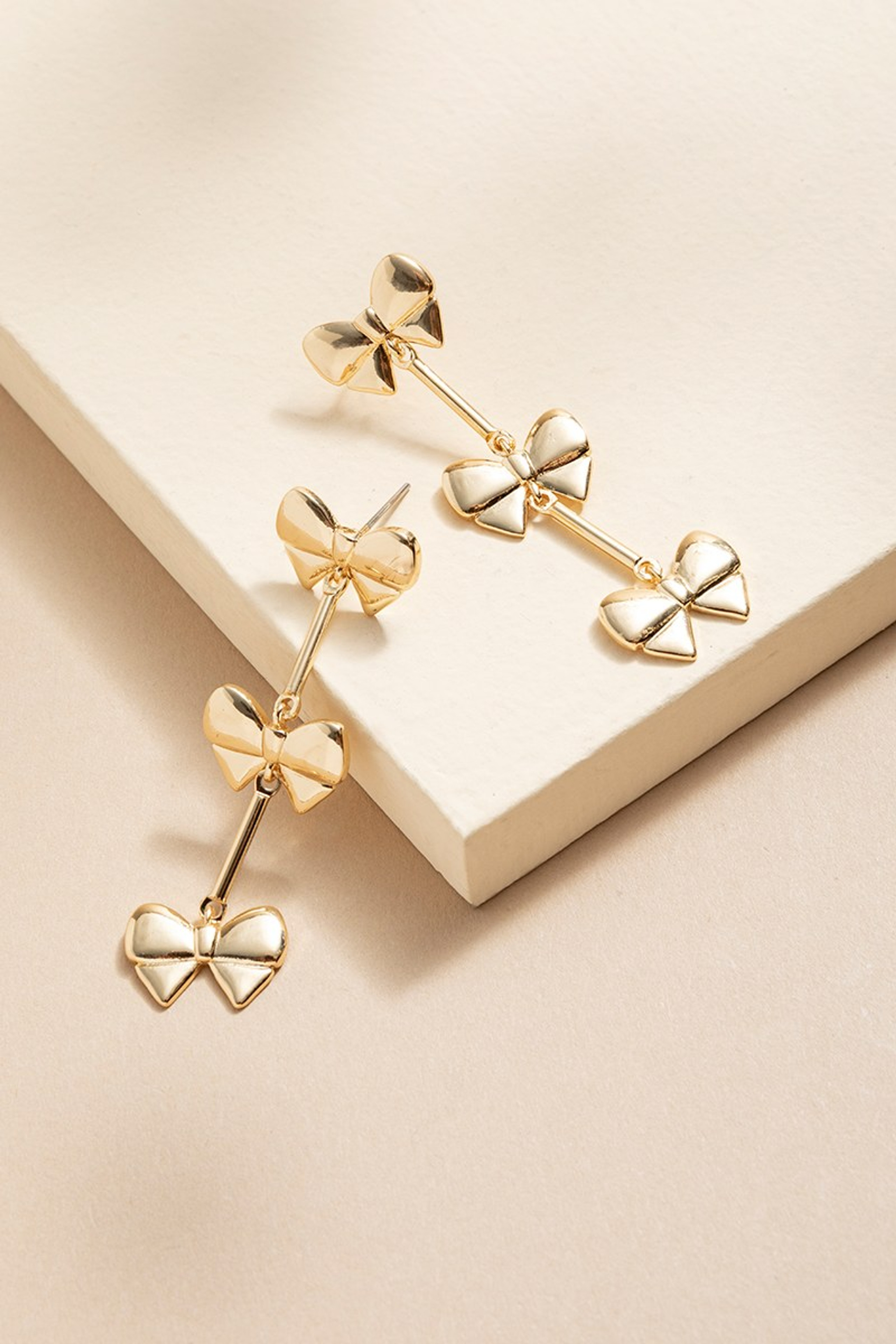 Coutney Puffy Bow Station Drop Earrings | Francesca's
