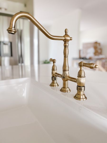 We love our Kingston brass kitchen faucet!

#LTKFind