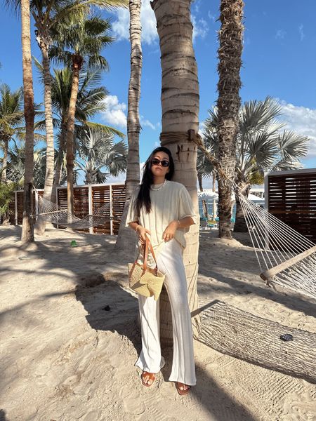 Short sleeve ribbed striped top and trousers, brown sandals, sunglasses oval, woven straw bag, necklace pearl 

#LTKtravel #LTKeurope #LTKSeasonal