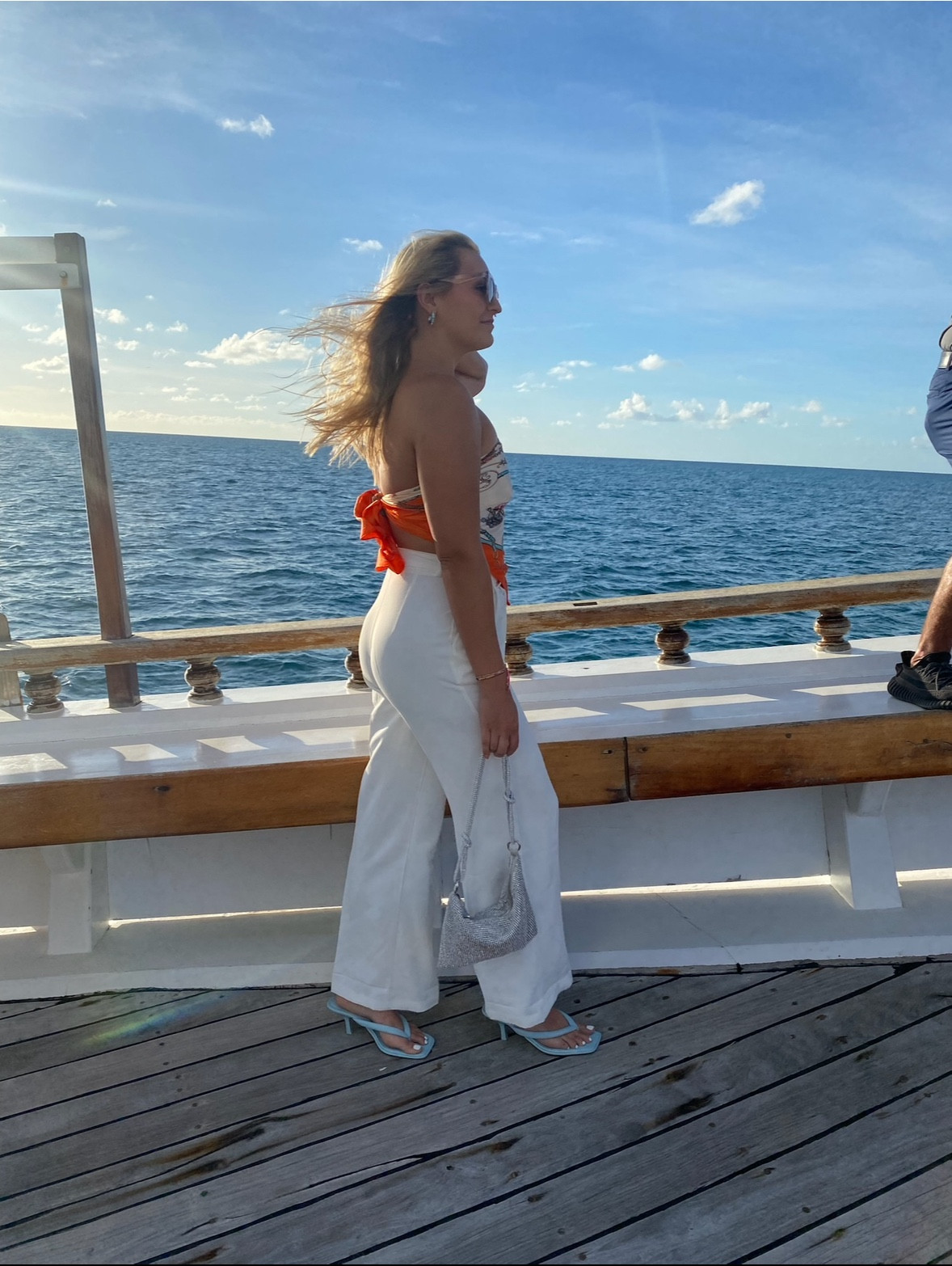 Heading on vacation soon? Shop one of my favorite tropical, dinner-boat cruise looks! Planned this outfit all around the headscarf I tied into a top. Opted for white pants, glam bag, light blue heels, and some fun accessories. Still one of my favorite looks to date 🩵

#LTKparties #LTKswim #LTKtravel