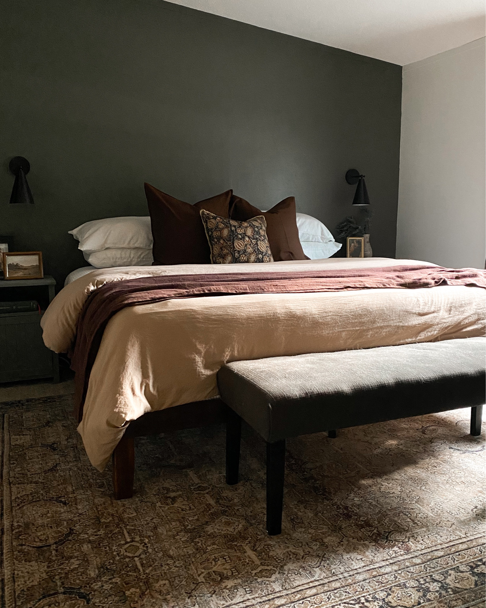 My bedroom rug is included in the Wayfair sale! 

Honestly was a little nervous about going with the dark patterned rug when I have a white dog that lives to shed, but it’s ended up being the least dog-hair-covered rug in my house! It’s a printed pattern (and still surprisingly comfortable under foot) so it hides things very well. 10/10 for me! 

I have the 7’6”x9’6” and it works well under my king size bed. I do with it was a tiny bit bigger, but where we’re planning to move soon I wanted a size that’d be more versatile a new floor plan. 

Green bedroom. Dark and moody bedroom. Accent wall bedroom ideas. Brown bedding. Traditional bedroom ideas 

#LTKstyletip #LTKhome #LTKfamily