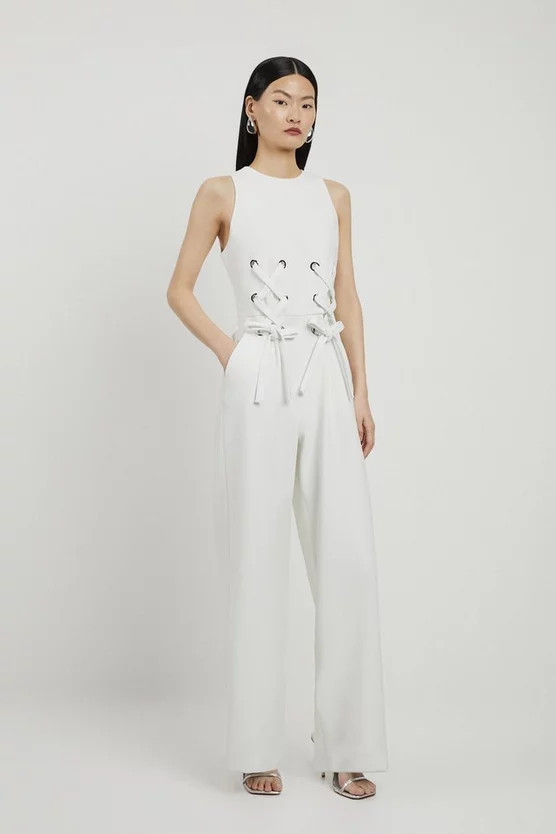 Compact Stretch Eyelet Detailed Ribbon Jumpsuit | Karen Millen UK + IE + DE + NL