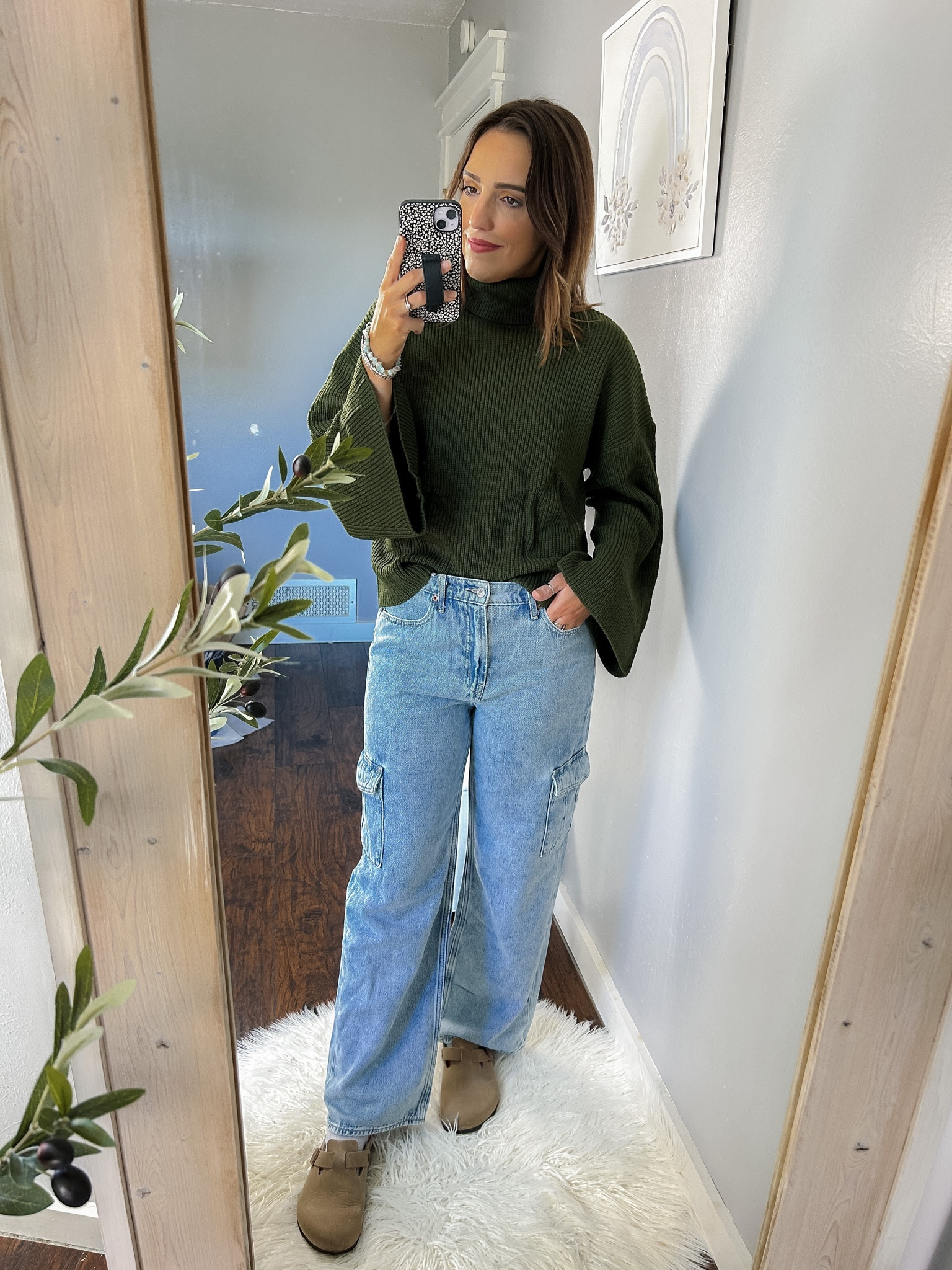 Amazon sweater / Turtleneck bell sleeve oversized sweater — TTS, S
Old Navy cargo wide leg jeans — TTS, 6
Birkenstocks - TTS
Made by Mary silver disc choker necklace
Victoria Emerson cuff bracelet
Round white shag rug

#LTKfindsunder50 #LTKstyletip #LTKSeasonal