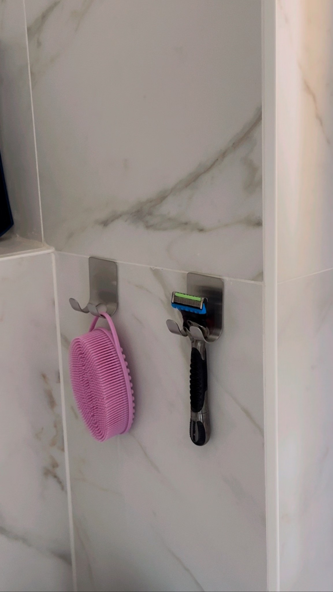 Adhesive hooks to help keep your shower organized in a renter friendly way!

#LTKFindsUnder50 #LTKHome