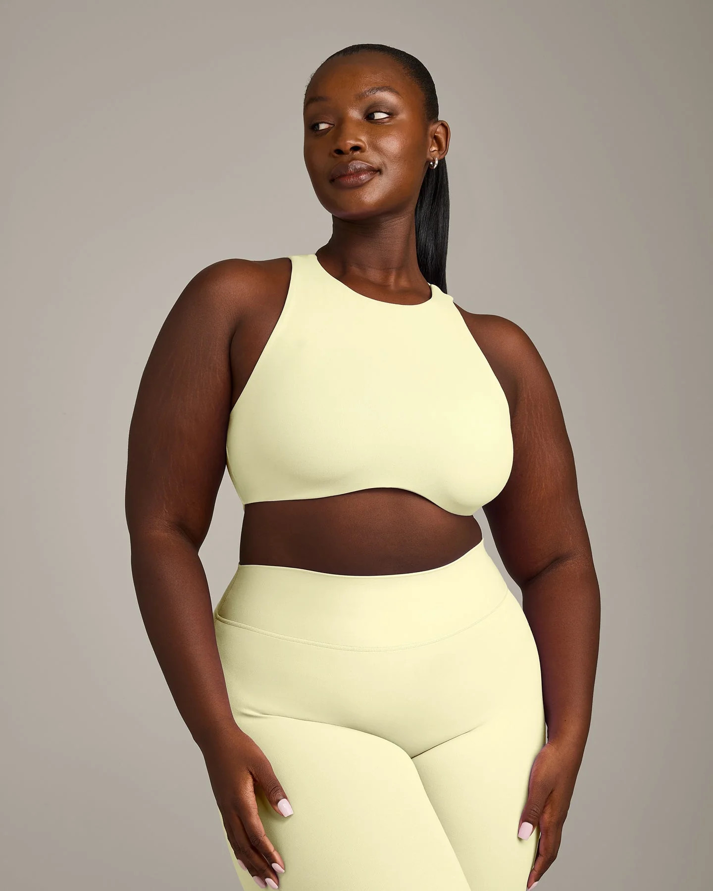 SoftMotion™ High Neck Sports Bra with Gray Logo 
 Pastel Yellow | Oner Active (UK / US)
