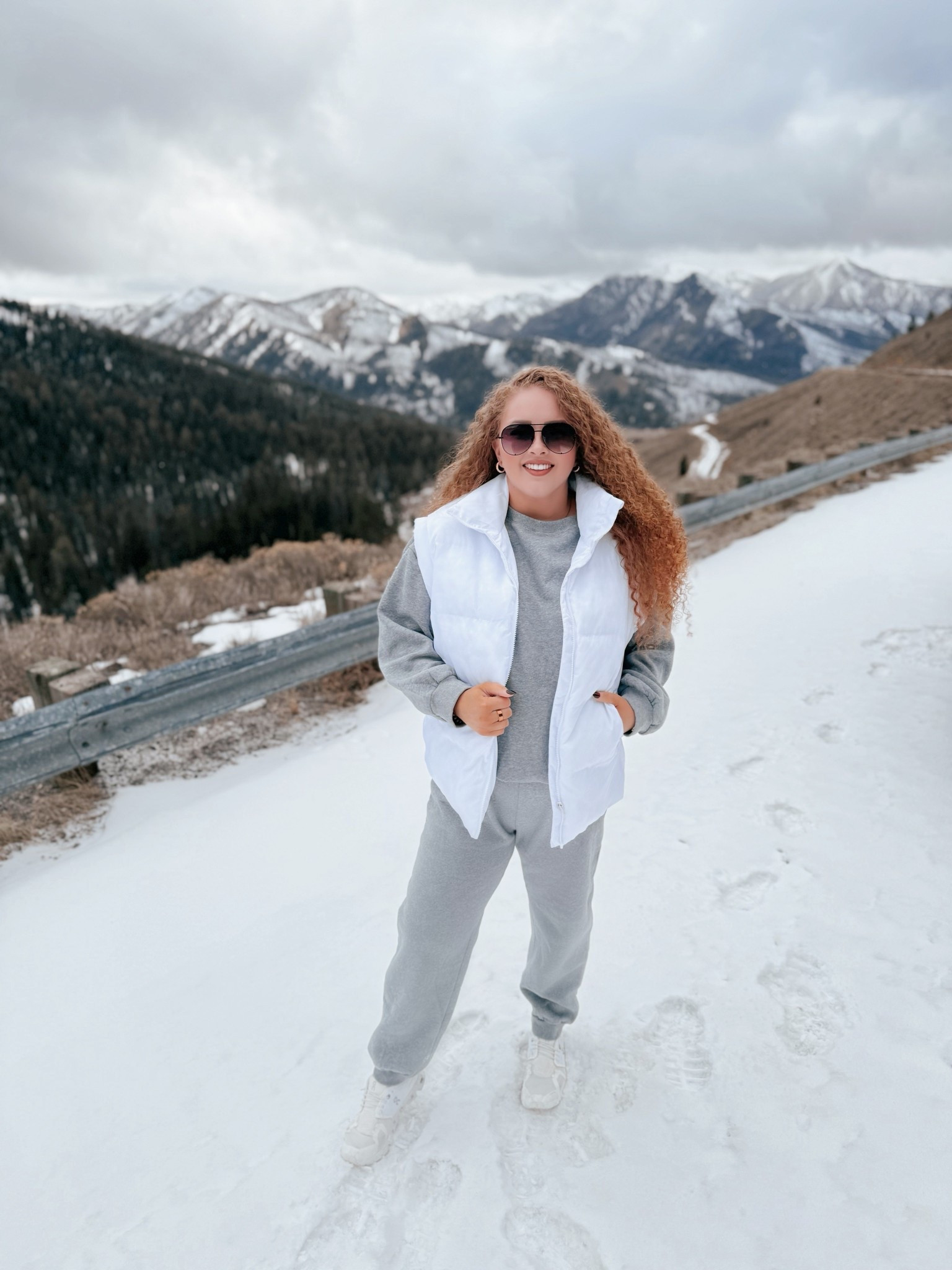 Winter magic in the mountains ❄️✨ Bundled up in my cozy gray set, white puffer, and the comfiest on cloud sneakers while soaking up this snowy view 🤍 amazon two piece set | amazon gray two piece set | amazon gray lounge set | amazon lounge set | sneakers | white sneakers | white on cloud sneakers | on cloud sneakers | amazon winter travel outfit | winter travel outfit | amazon winter travel outfit | amazon fashion | amazon finds | amazon look | amazon outfit | winter lounge set | winter lounge | winter fashion | winter finds | winter outfit inspo | winter fashion inspo | winter 2025 | winter outfit ideas | cozy winter set | gray two piece outfit | white puffer vest | mountain outfit inspo | winter travel style | cold weather fashion | comfy athleisure set | neutral winter look | snow day outfit | amazon fashion finds | winter wardrobe staples | casual winter outfit | cozy girl aesthetic | outdoor winter style

#LTKdayinmylife #LTKMidsize #LTKootd