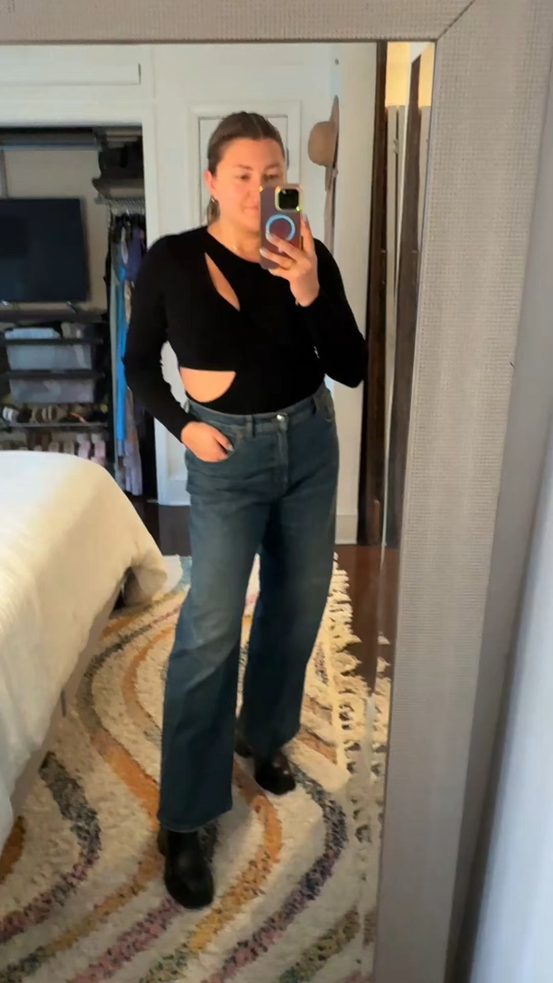 A sweater bodysuit in black with cutouts just in case you get hot. and my favorite jeans! 

#LTKMidsize #LTKSeasonal #LTKHoliday