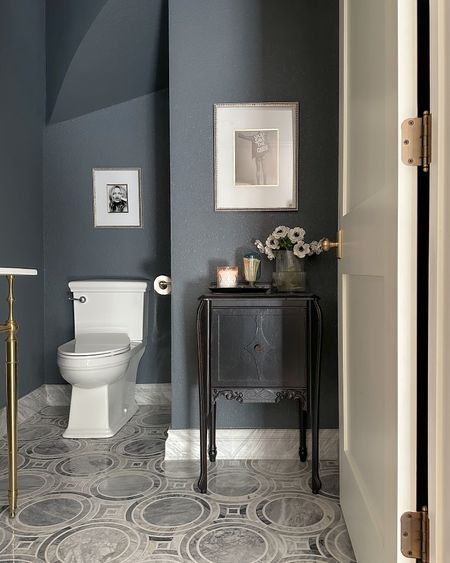 Moody powder room decor 🖤 My cabinet is vintage and flooring is from Floor & Decor (couldn’t link)

#LTKhome #LTKstyletip #LTKfindsunder50