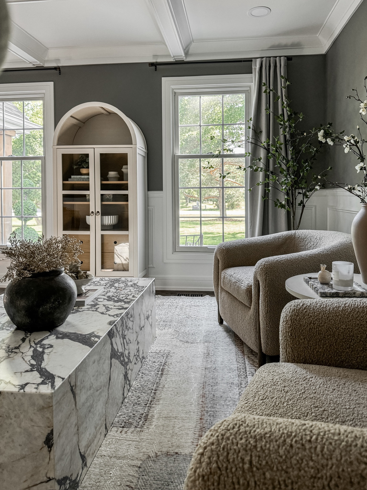 The prettiest arched cabinet! I love how the white finish contrasts so beautifully against a darker wall! Under $500 and such a timeless piece. 

#LTKStyleTip #LTKHome