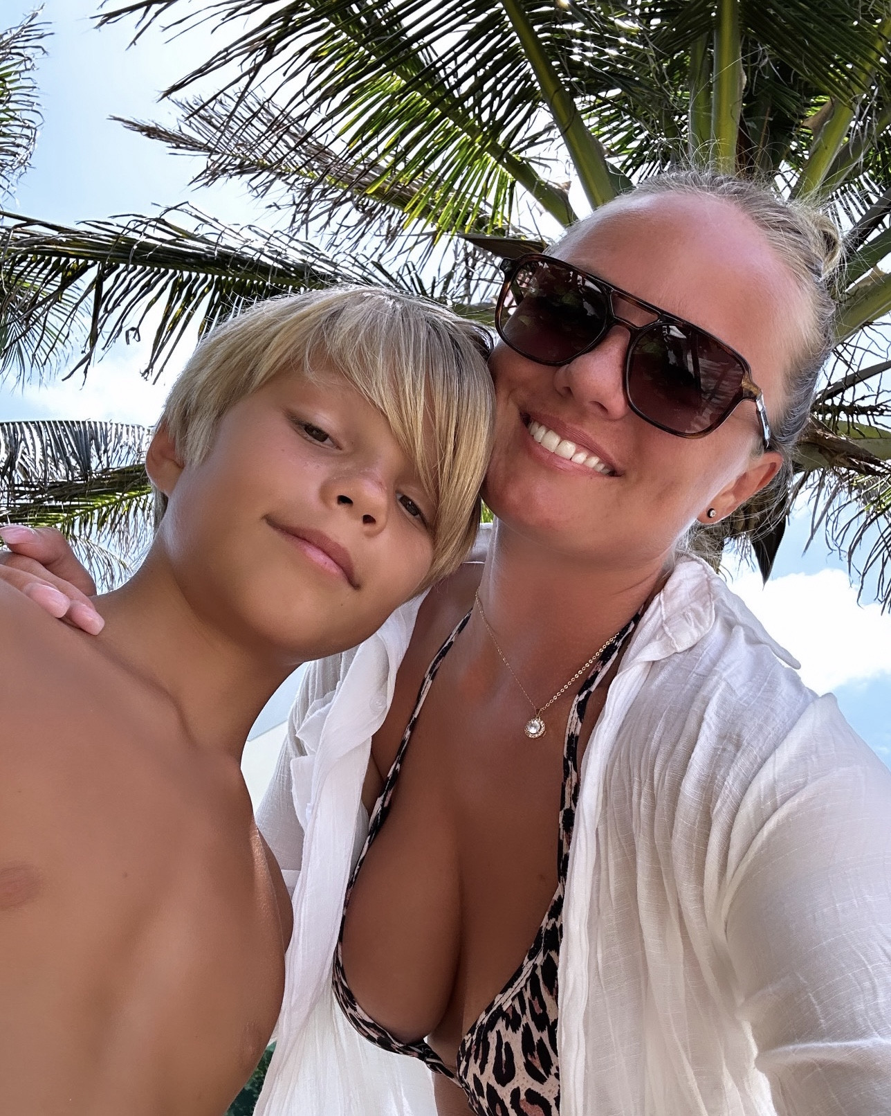 Animal print bikini
Leopard cheetah print swimsuit 
Brown sunglasses 
White cover up
Beachwear 

#LTKSwim #LTKSeasonal #LTKTravel