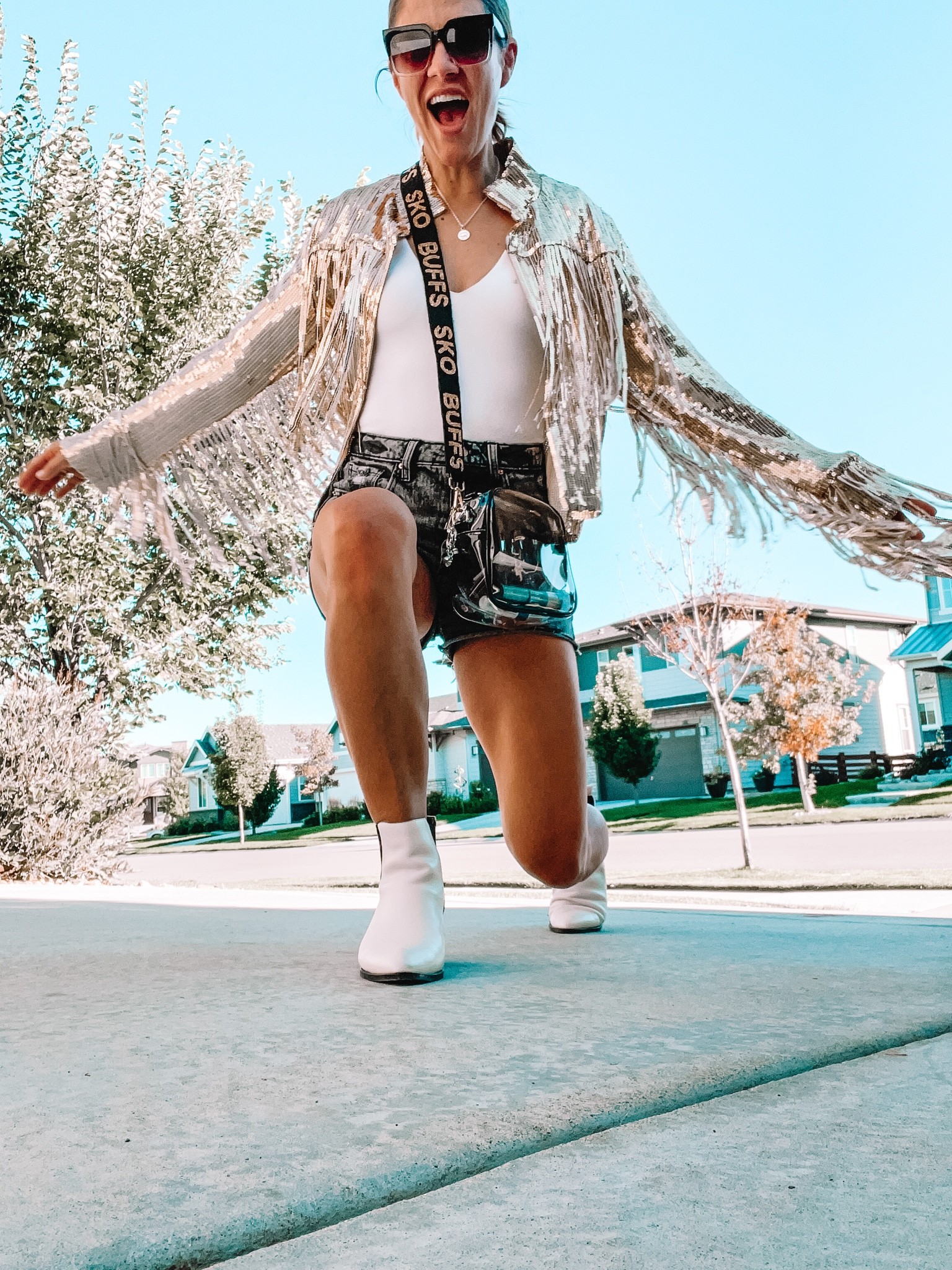 Game Day! Gold sequin jacket. Gold jacket. Fringe jacket. Black denim shorts. Gameday purse strap. Purse strap. Game day outfits  

#LTKSeasonal #LTKitbag #LTKstyletip