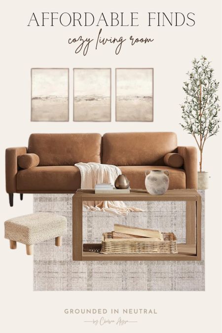 I love nothing more than a cozy living room aesthetic. This brown sofa is timeless and designed to stand everyday wear and tear. I also love the olive tree for added greenery. 

#LTKHome #LTKStyleTip