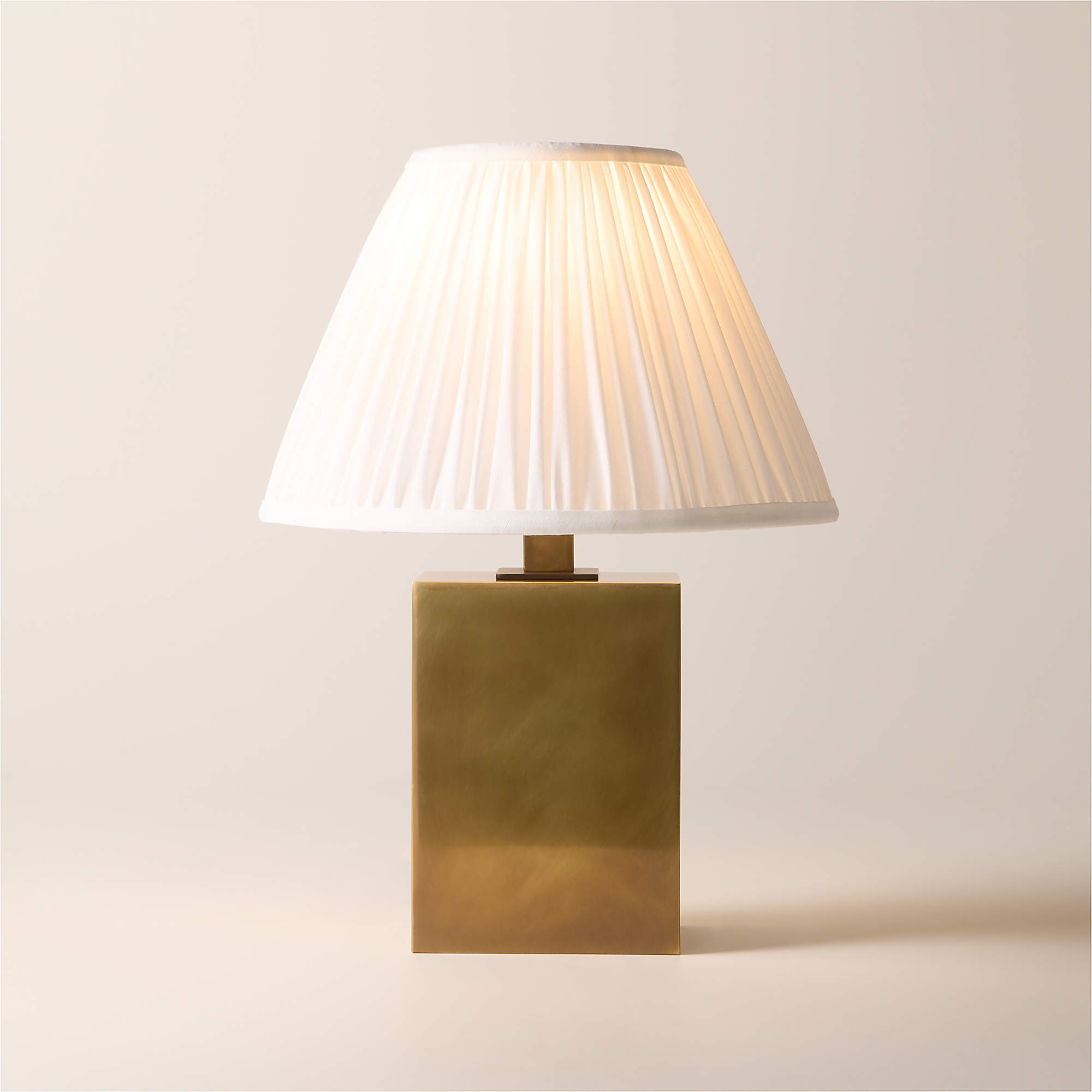 Carmichael Small Aged Brass Table Lamp with Pleated White Shade + Reviews | CB2 | CB2