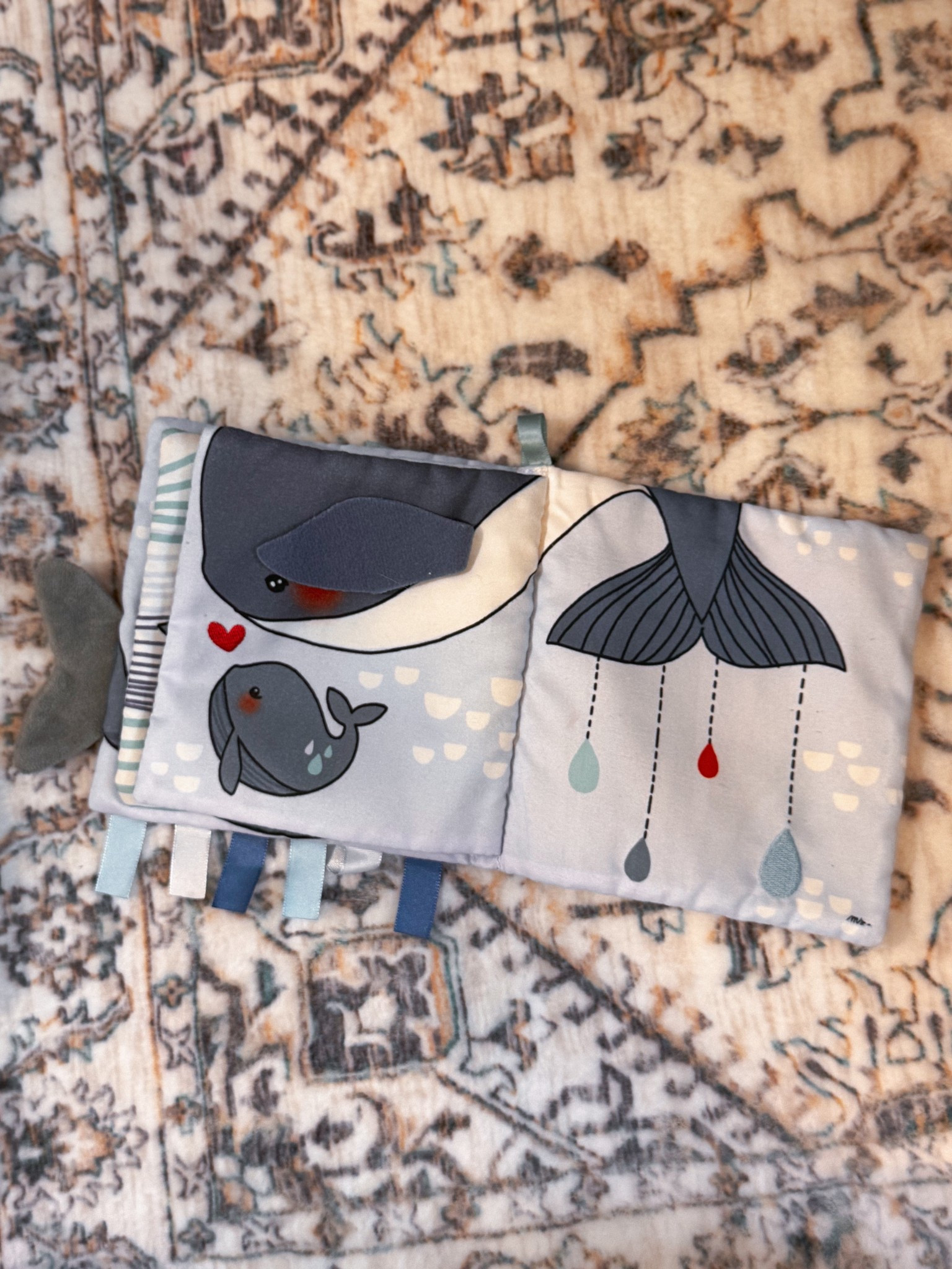 Soft, sweet, and perfect for tiny hands—this ocean-themed cloth book is a hit in our house. With sensory tags, interactive flaps, and calming colors, it’s a go-to for tummy time, stroller rides, and quiet play. 

#BabyBook #ClothBook #SensoryPlay #MontessoriBaby #OceanTheme #TummyTimeToys #InfantToys #BabyShowerGift #EarlyLearning #QuietToys #Taggies #FirstBooks #NewbornMustHaves #DevelopmentalToys

#LTKBump #LTKBaby #LTKKids