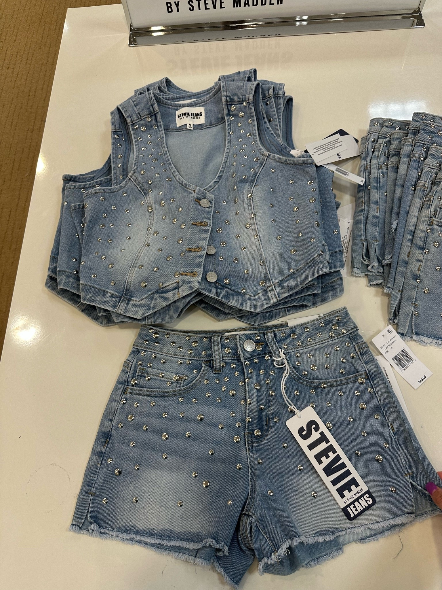 Love this denim rhinestone matching two piece set! It’s so cute! This would be adorable for a country concert! The top is $56 & ranges from sizes XS-XL! The shorts range from sizes 24-32 & they’re $49!

#LTKMidsize #LTKPetite