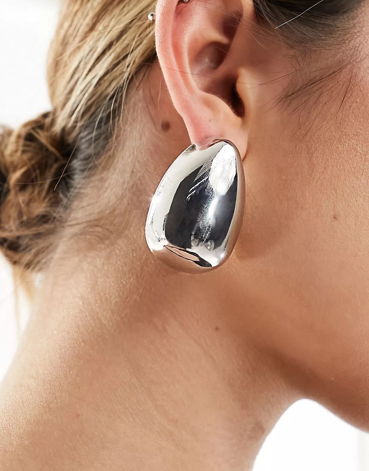 ASOS DESIGN stud earrings with oversized teardrop design in silver tone | ASOS (Global)