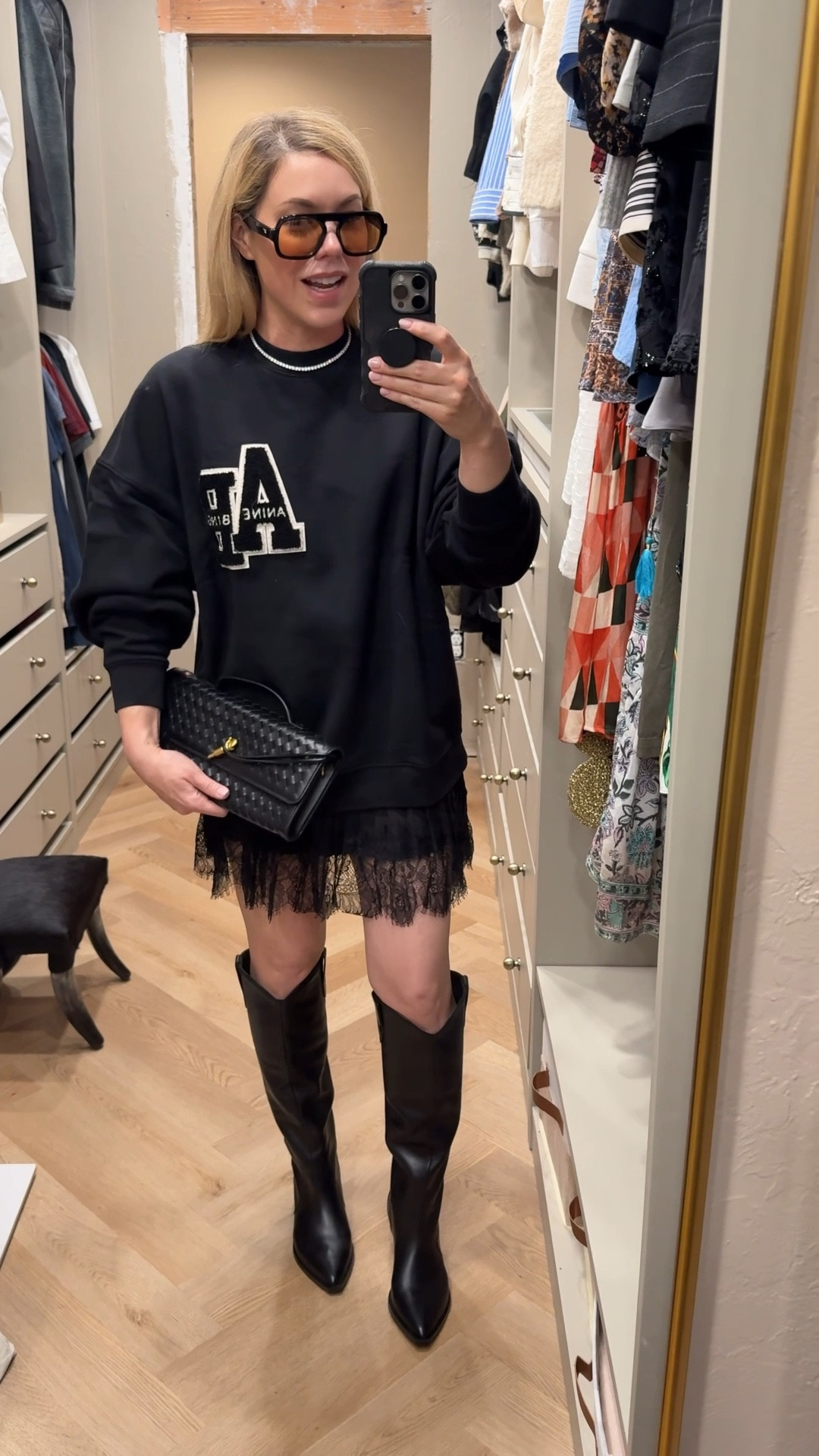 Anine Bing sweatshirt 
Lace skirt
Western boots 

#LTKSeasonal #LTKFindsUnder50