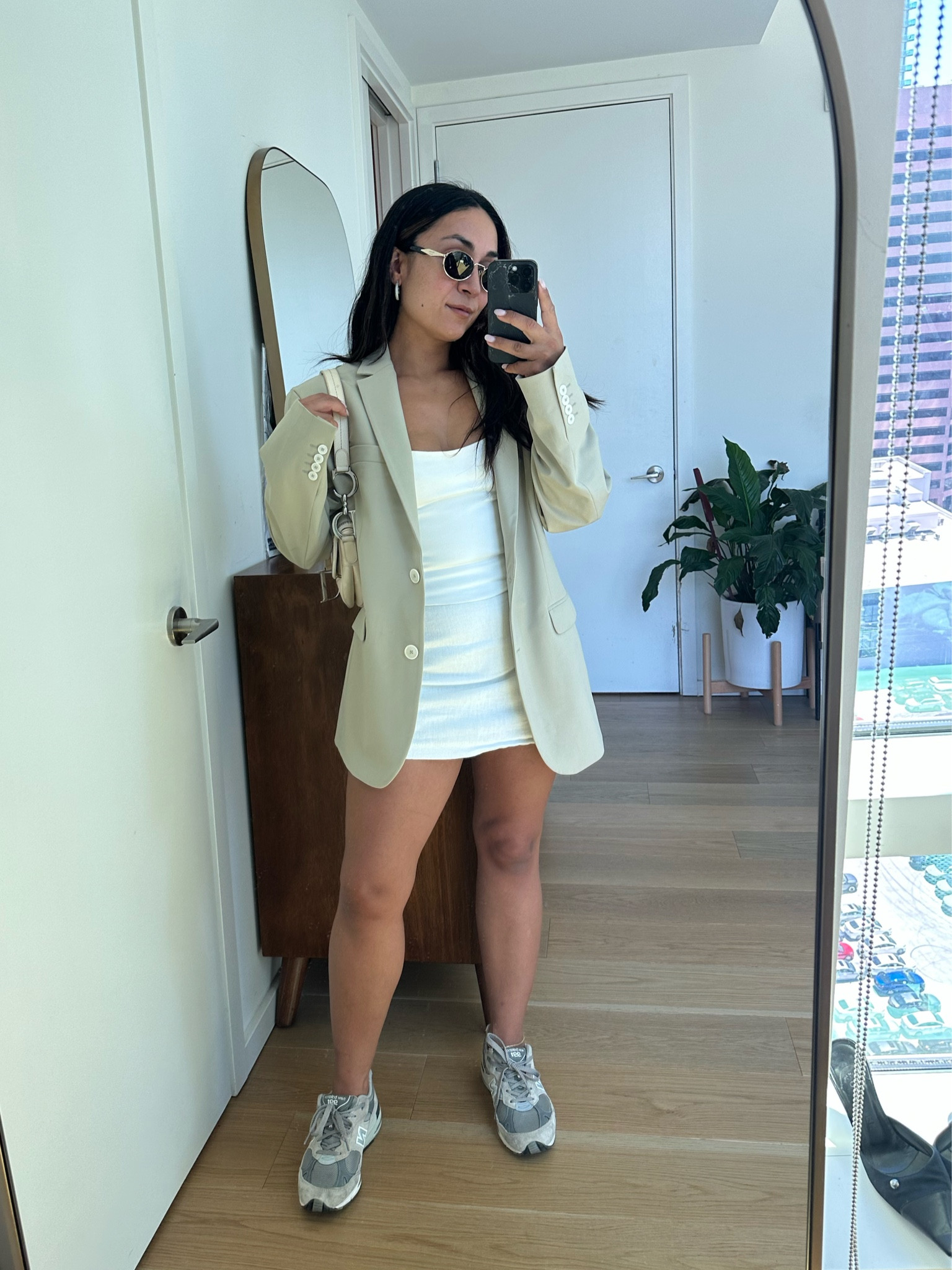 Fall Transitional Outfit: oversized blazer, white corset, linen mini skirt& sneakers. 

#LTKstyletip