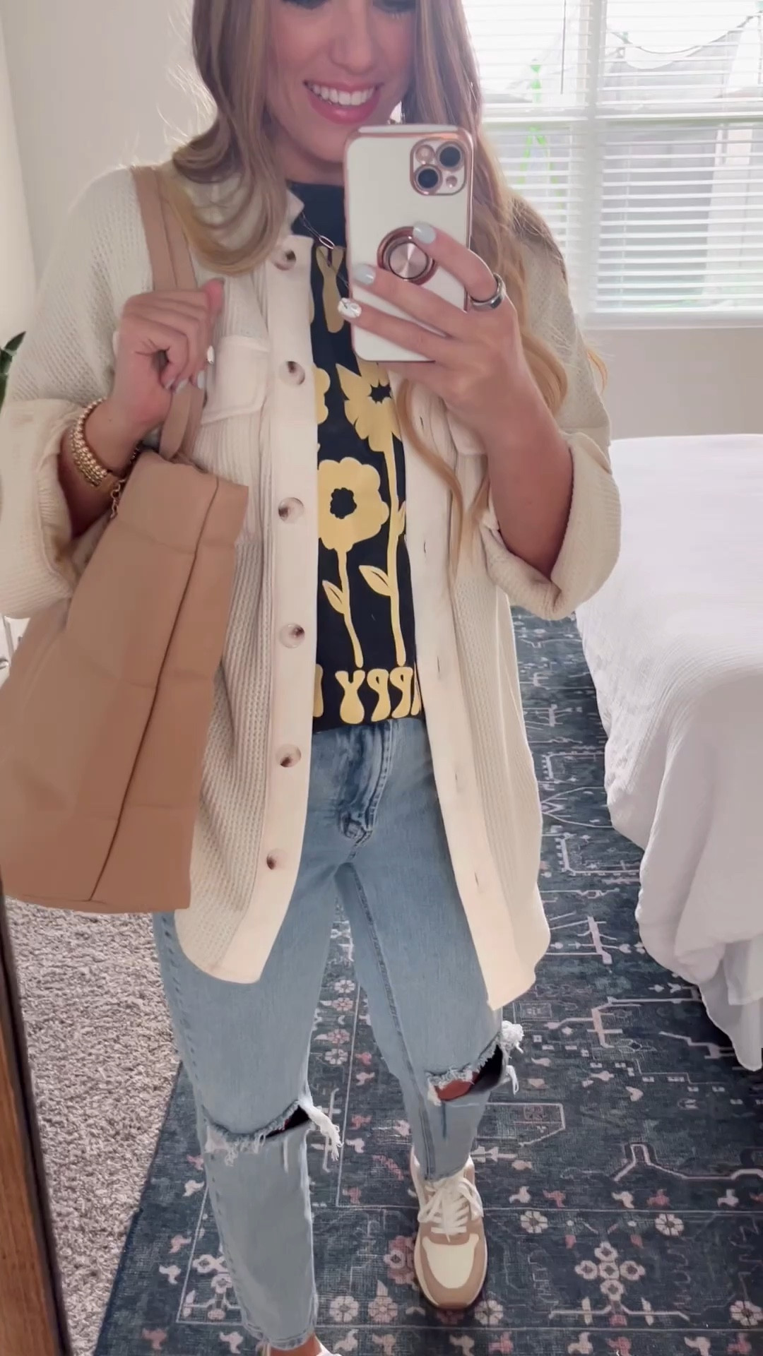 Fall Outfit Idea 
I’m in size 2 in jeans - TTS 
MEDIUM in the graphic tee 
Small in the waffle knit

#LTKstyletip #LTKunder50 #LTKSeasonal