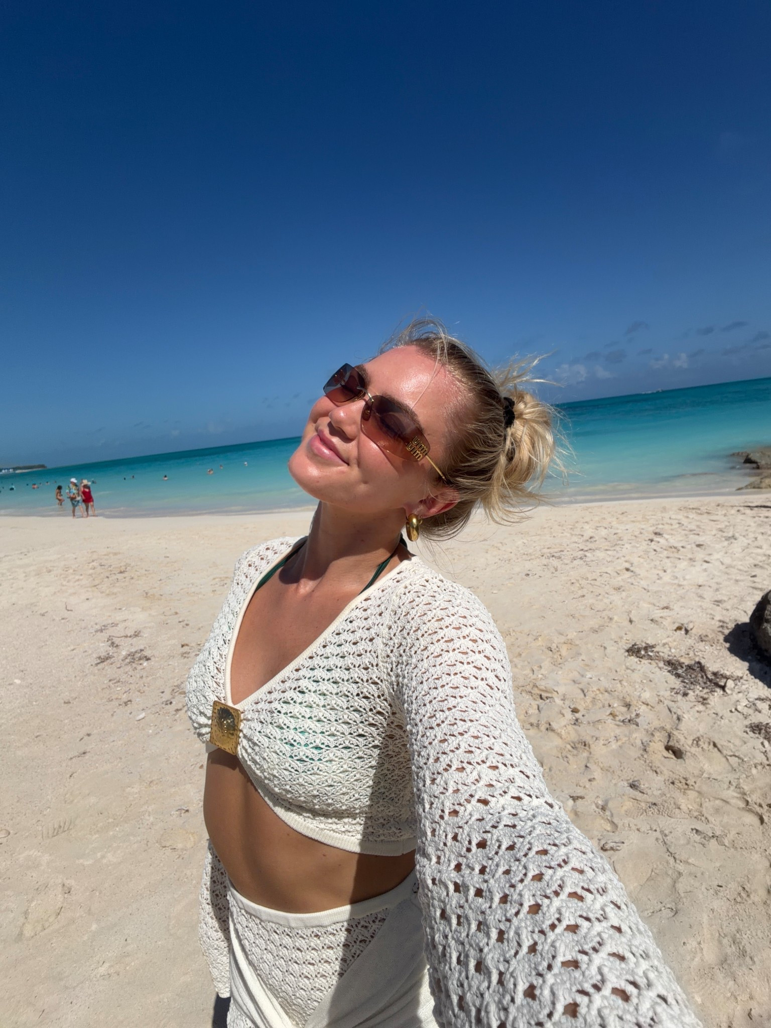 Beach cover up & sunnies

Wearing an xs in top & bottom — website restore often