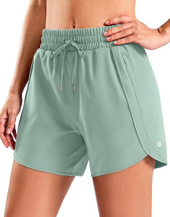 SANTINY Women's 3.5''/5''/7'' Athletic Gym Running Shorts Zipper Pockets | Amazon (US)