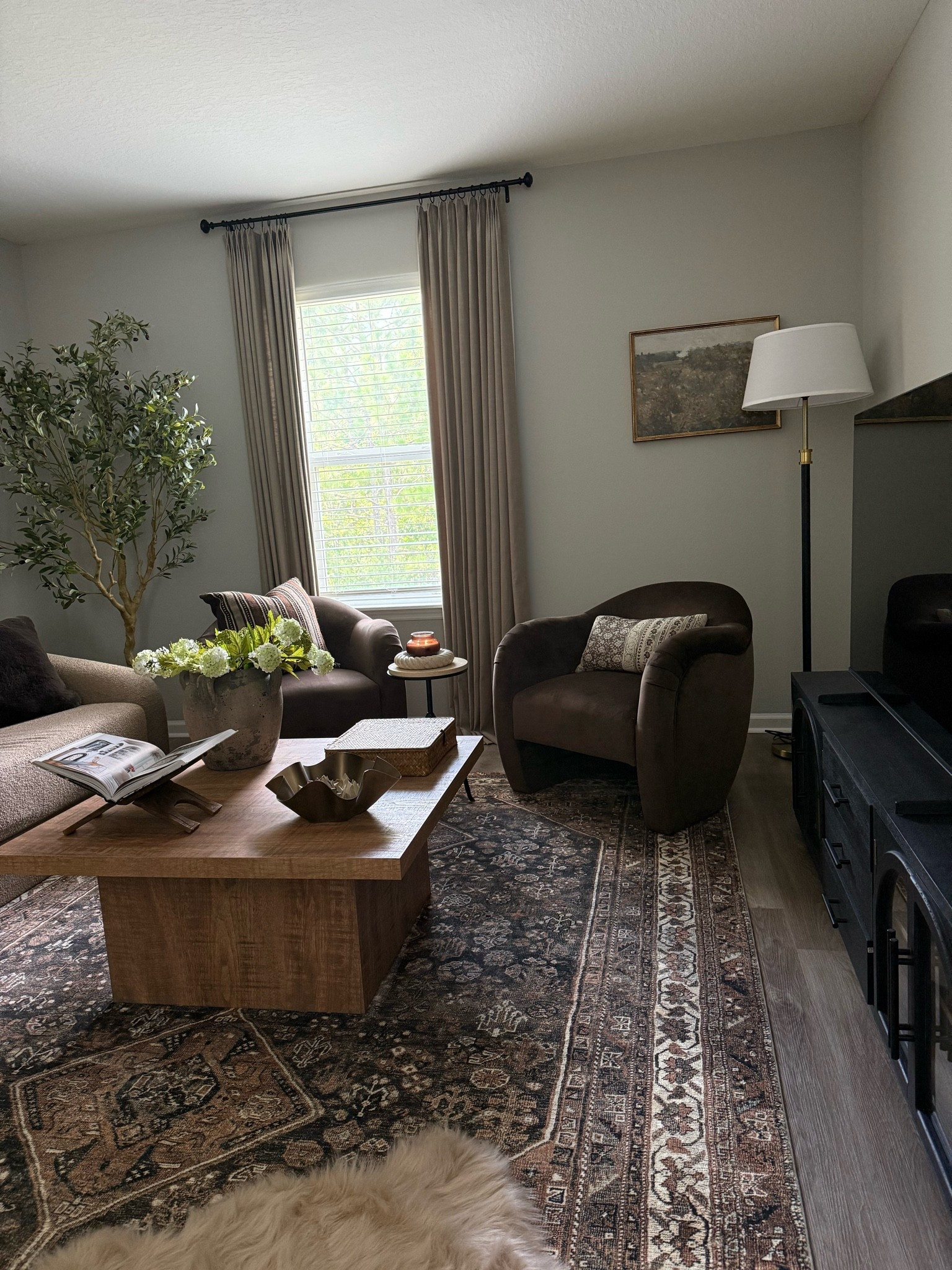 #ad Cozy loft views ft my affordable coffee table, chocolate brown chairs & side table- all from @Wayfair 

#wayfair #wayfairpartner 

Loft, living room, moody living room, affordable coffee table, accent chairs, floor lamp, side table, designer inspired home finds

#LTKHome #LTKSaleAlert