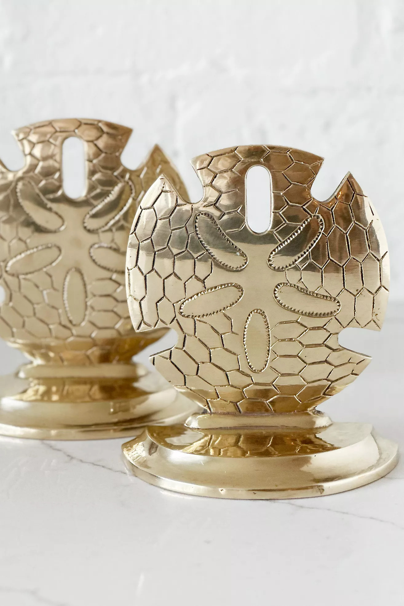 Old Flame Candle Co. Vintage 1960s Brass Sand Dollar Bookends | Anthropologie (US)