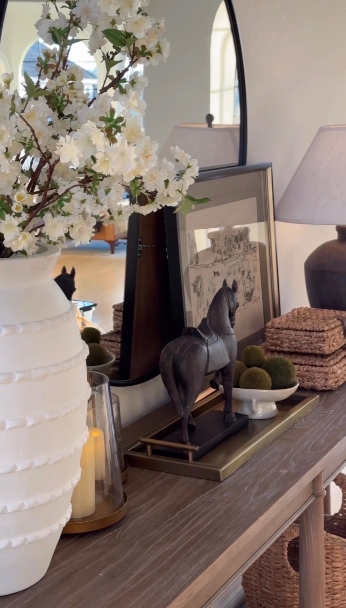 Layering done right in our spring entryway! 


#LTKSeasonal #LTKHome