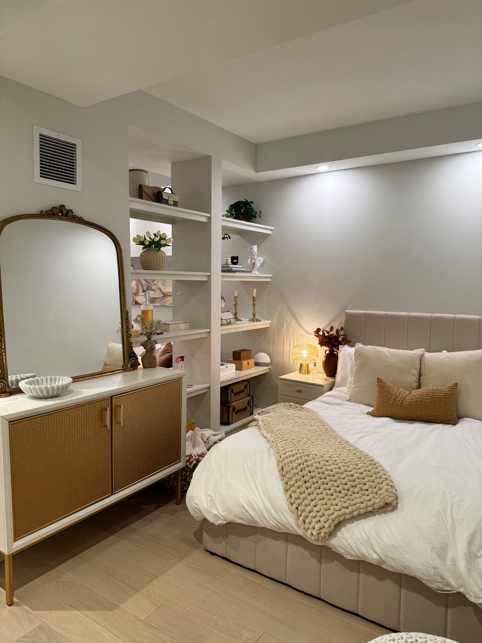 Bedroom setup. This Anthropologie mirror fits perfectly with the sideboard. Also this bed lifts up for storage which is a game changer! 
-
Home, bedroom furniture, apartment decor, home decor, bedroom decor, neutral, nightstand, table lamp, throw blanket, decorative bowl, comforter

#LTKhome