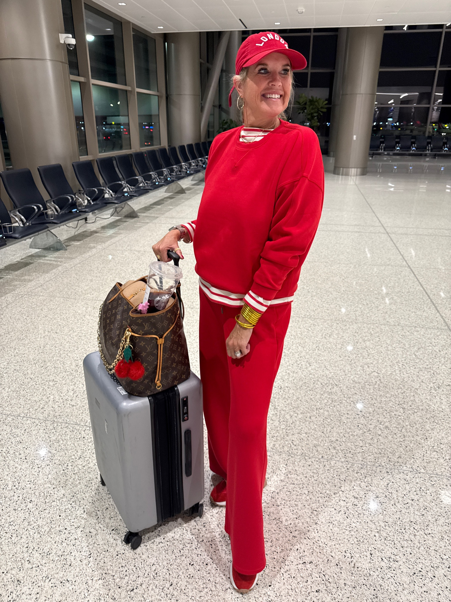 Travel outfit…

Spanx air essentials 
-Wide leg pant fits tts
-Striped boat neck long sleeve tee fits tts 
- crew neck tunic sweatshirt 
Buttery soft and oh so comfy

🚨my code got an increase -Save 20% with my code: DEARDARCYXSPANX


Red London ball cap 

- Budha girl bracelets
Red Madison Masion sneaker- so comfy and hand sewn 

-Vera Bradley hard suitcase
-Louise Vuttion never full tote (large)   
-Bag charms from Anthropologie 


#LTKTravel #LTKGiftGuide #LTKStyleTip