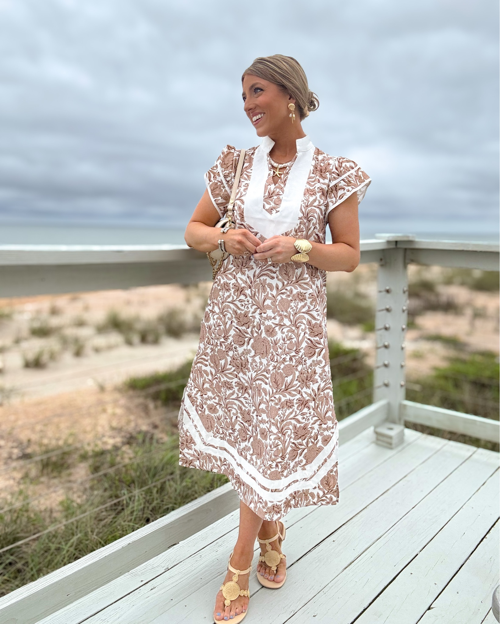 Date night 💫 this might be one of my favorite versatile outfits yet!!

Wore this breezy neutral printed dress for some shopping and then straight to dinner 🍽️ and it was PERFECT for both. Lightweight, flattering, and so easy to dress up or down — the kind of piece you’ll reach for all summer long.

Paired it with these under-$30 sandals (SO comfy + cute 🤍), gold statement jewelry, and a simple shoulder bag to pull everything together. The whole look gives coastal chic, high-end vibes… but it’s all Amazon + Walmart 🙌🏼

If you’re planning any vacations, date nights, or just want an effortless summer outfit you can wear all day into night — this is it ✨

Sizing: dress runs TTS, great length (I’m 5’2”)
Quality: lightweight, breathable, not see-through ✔️
Perfect for: shopping, dinner, vacation outfits

#amazonfashionfinds #walmartfashion #summerstyle #coastalstyle #vacationoutfits #affordablefashion #ootdstyle #momstyle #neutraloutfit #resortwear #datenightoutfit #amazonstyle #walmartfinds #summeroutfits #petitefashion

#LTKootd #LTKPetite #LTKTravel