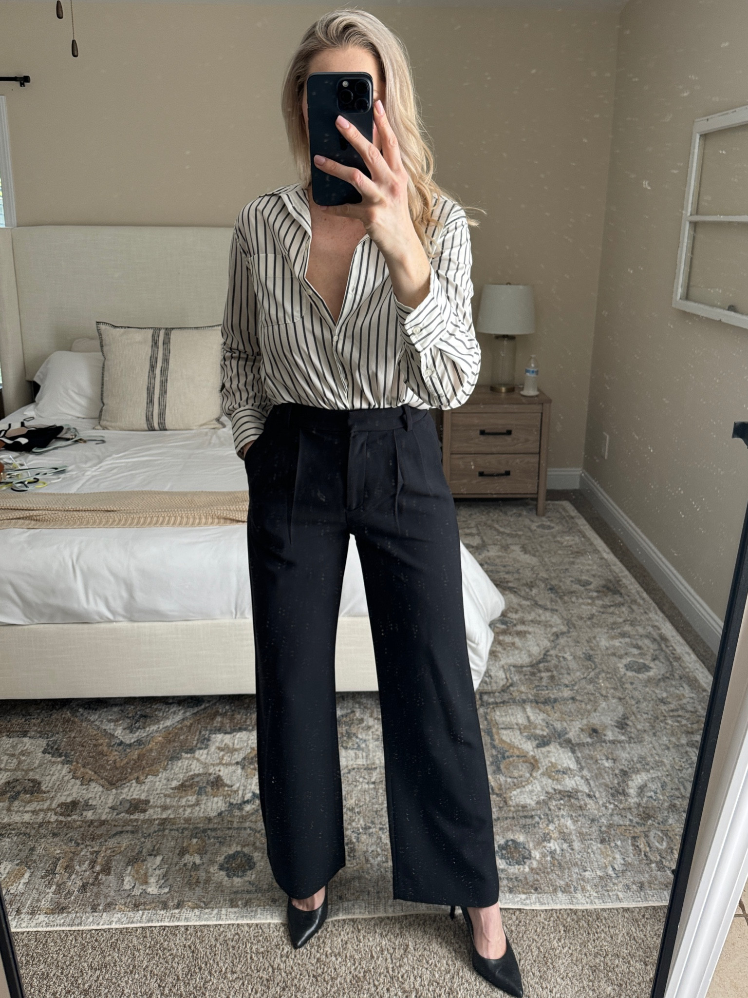 Black and white striped button down, black trousers and black heels

#LTKfindsunder100